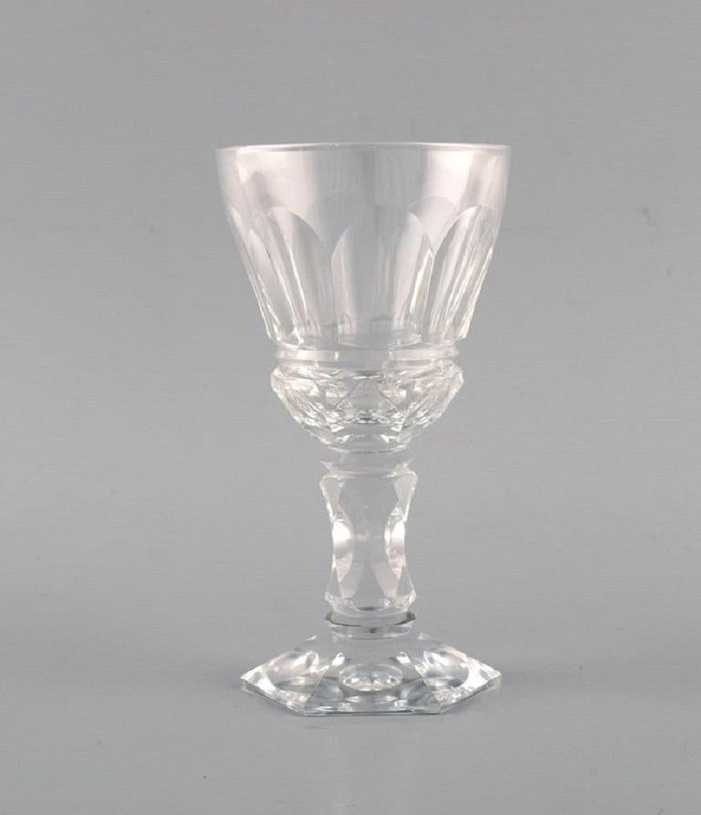 Baccarat, France. Three Art Deco white wine glasses in clear mouth-blown crystal glass. 
1930s.
Measures: 13.5 x 7.2 cm.
In excellent condition.