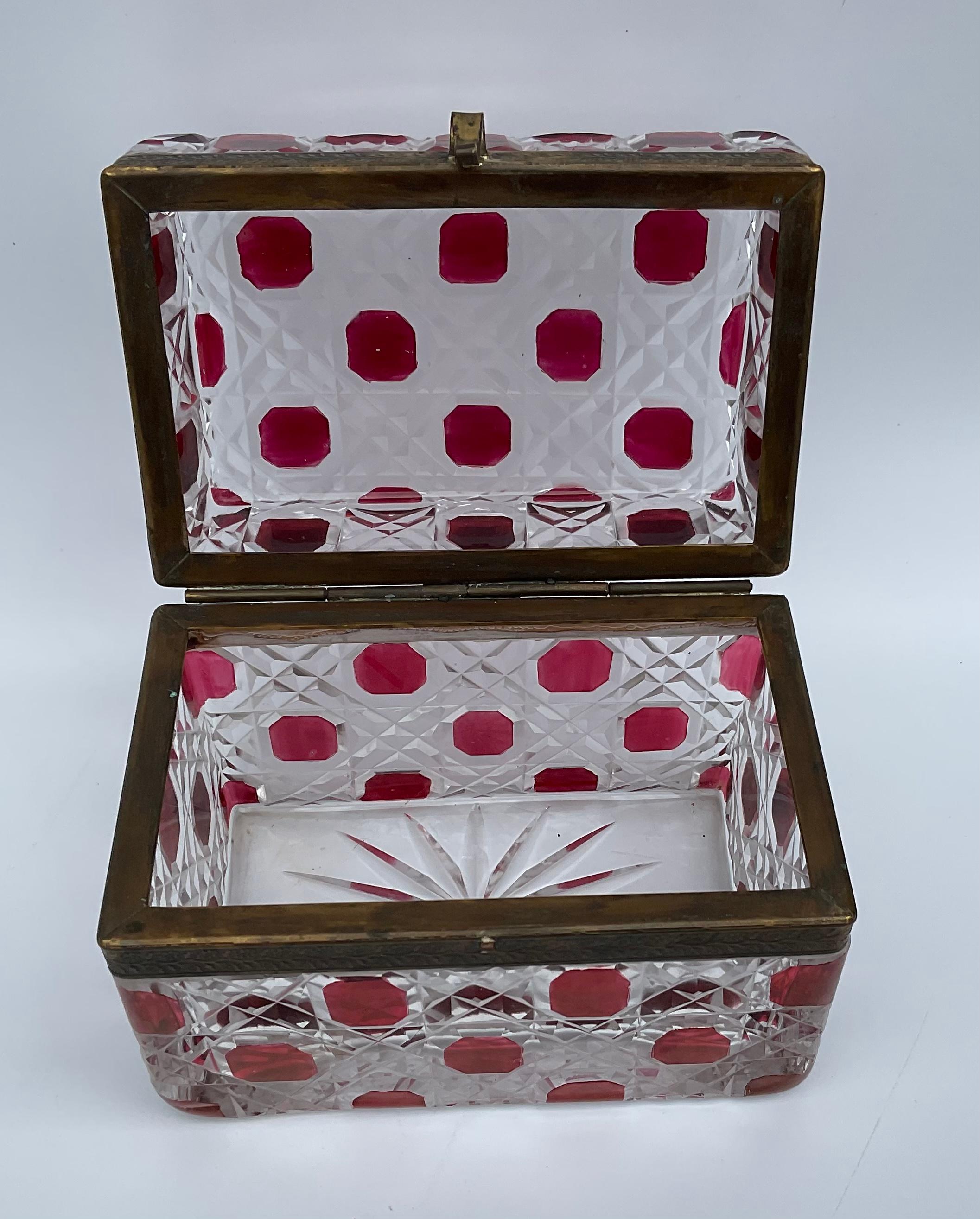 Baccarat French Art Deco Red geometric cut glass decorative box with hinged lid. This piece glistens as the glass quality is extremely high. Do not miss this amazing box.