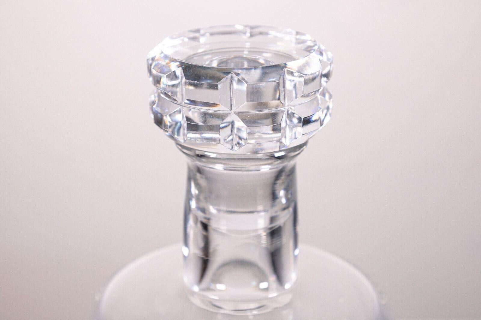 A Baccarat French crystal decanter. An absolutely stunning crystal decanter from French manufacturer Baccarat. This piece is a perfect addition to any bar, kitchen, or dining space. The design and construction of this piece is immaculate. This piece