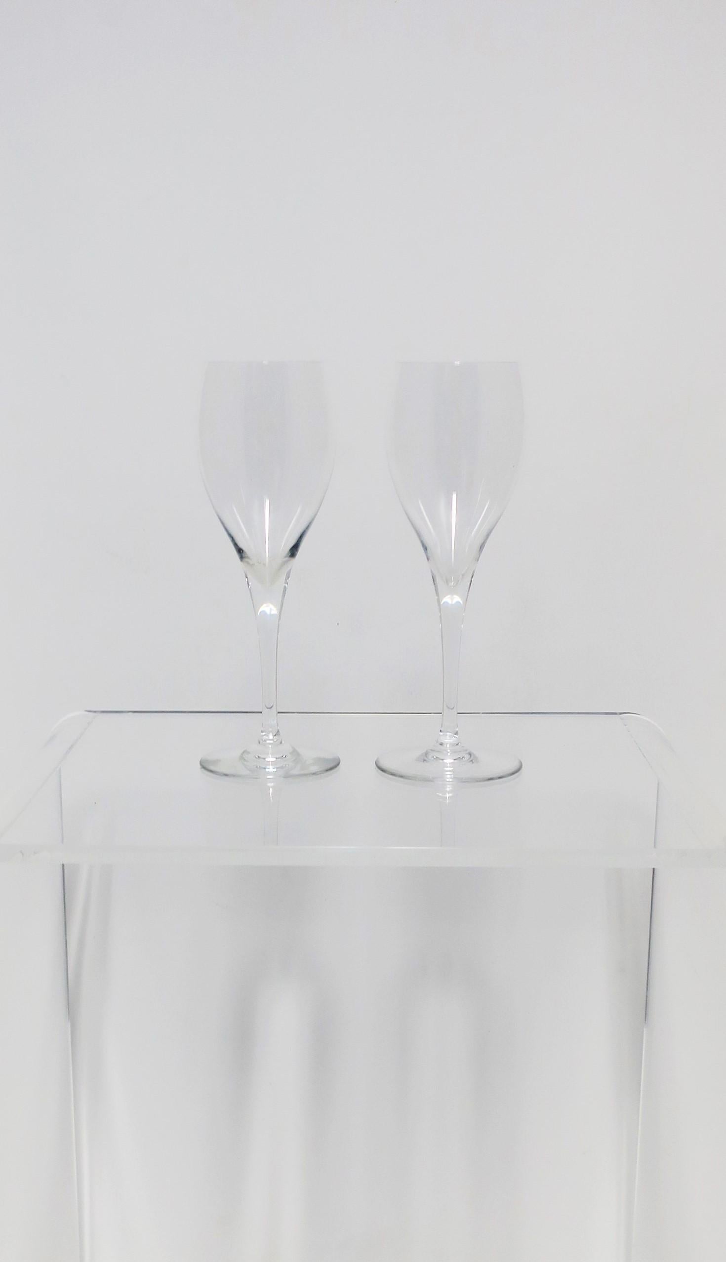 A beautiful set of two (2) Baccarat French St Remy crystal water or wine 'tulip' glasses, circa late-20th century, France. With acid mark on bottom: 