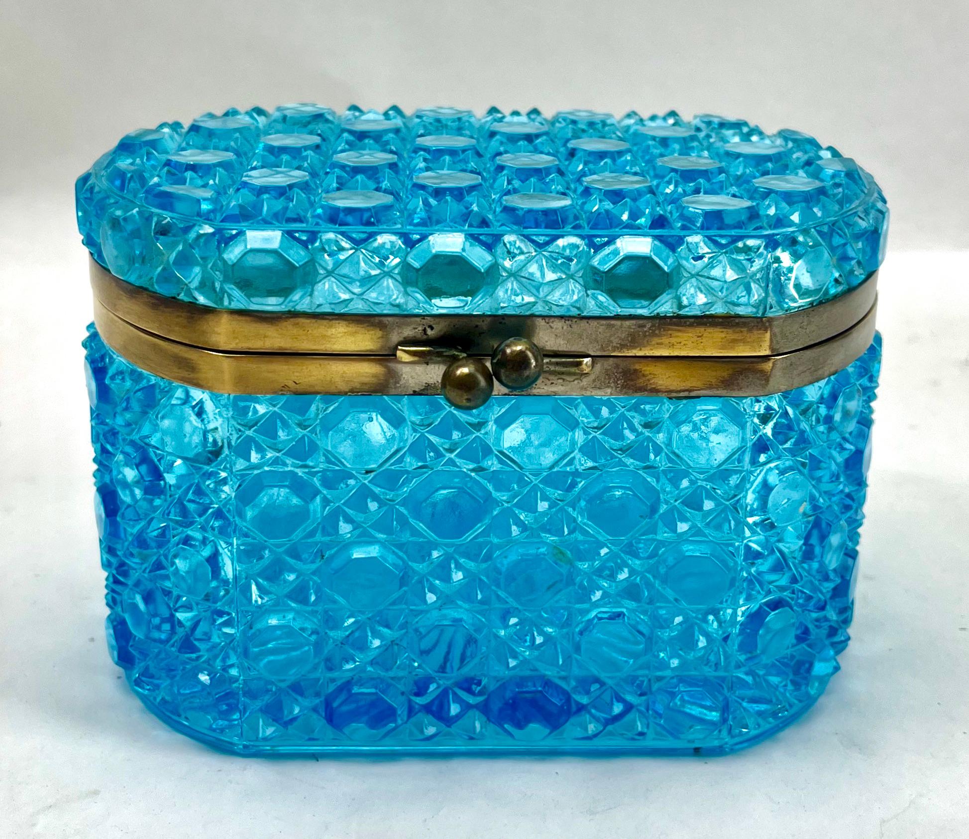  Baccarat French Cut Crystal Jjewelry Box with Brass Hardware.

A gorgeous French hand cut crystal jewelry box.
The box although is unsigned can be attributed to the Baccarat style. 
The design reminds one of the Hollywood Regency elegance. 
This