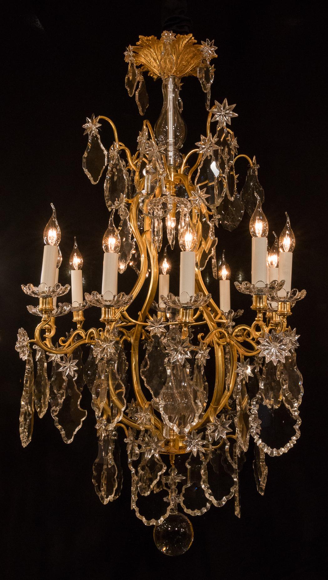 Baccarat, French Louis XV style, gilt bronze and crystal chandelier, circa 1880-1890.

Gorgeous gilt bronze and cut crystal chandelier in the Classic French Louis XV style, signed by The Cristalleries De Baccarat.
Our chandelier is composed of