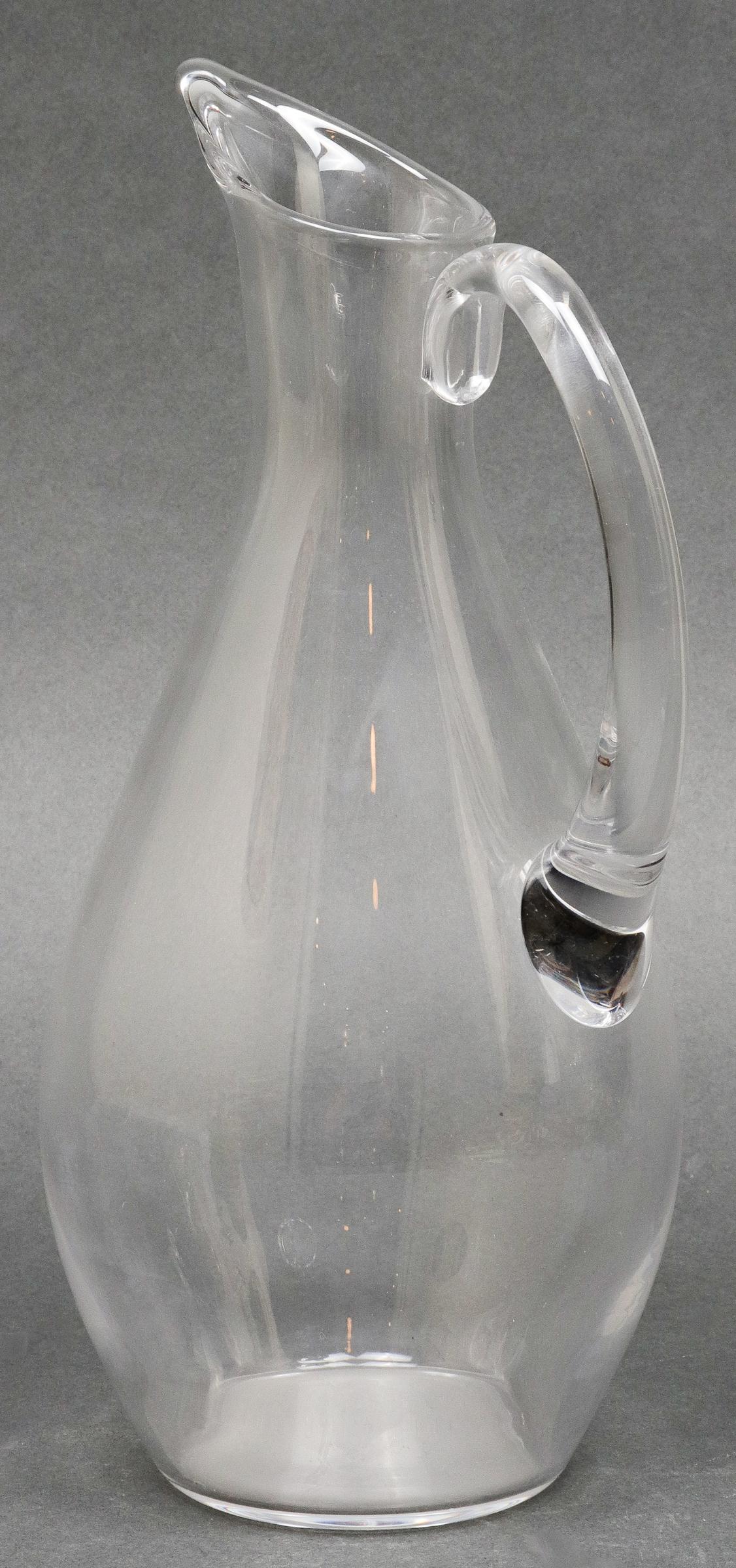 Baccarat modern colorless glass pitcher, acid-etched maker's mark underside. Measures: 11