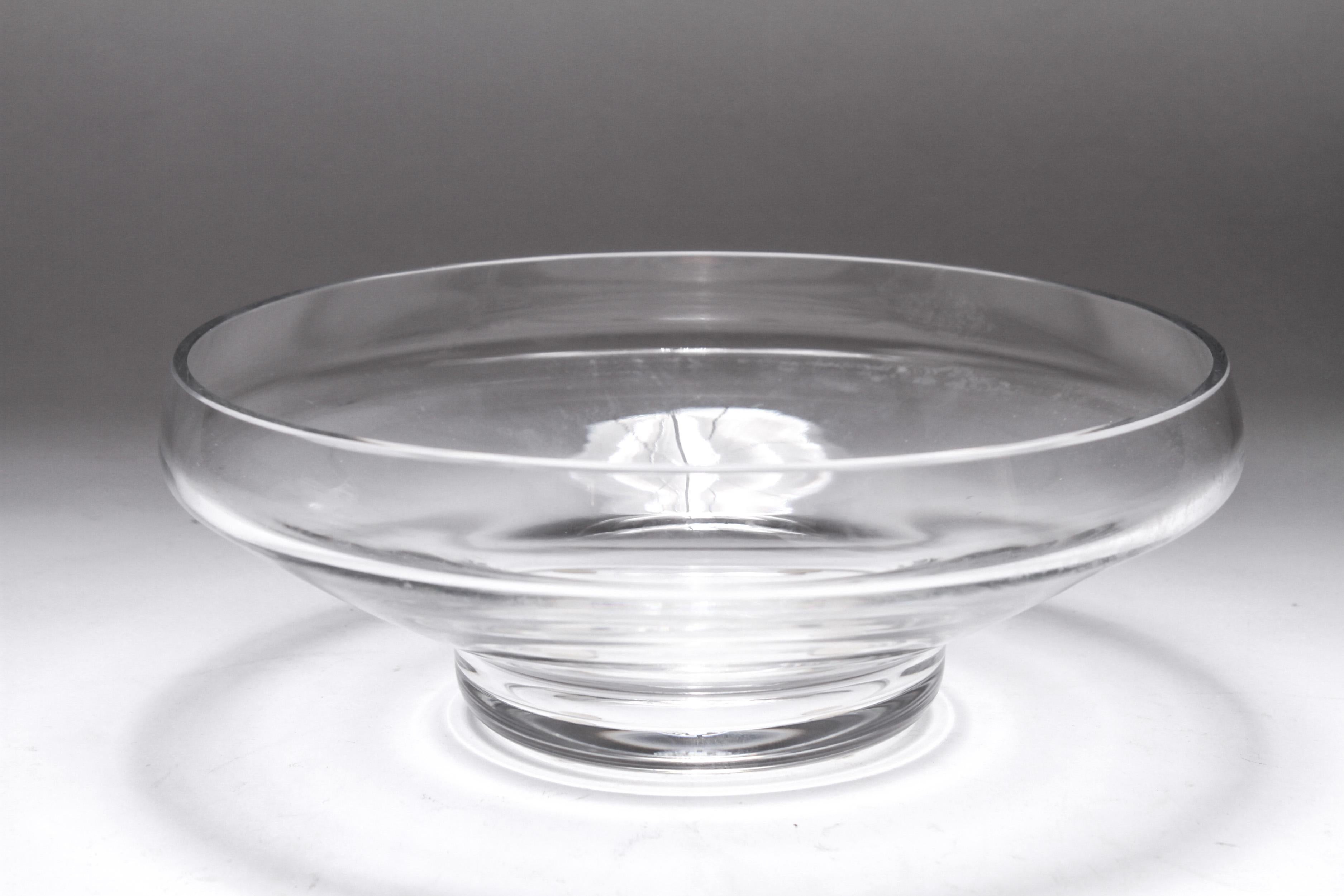 French modern crystal dish or bowl made by Baccarat. The piece has an acid-etched maker's mark to the underside. In great vintage condition with age-appropriate wear and use.