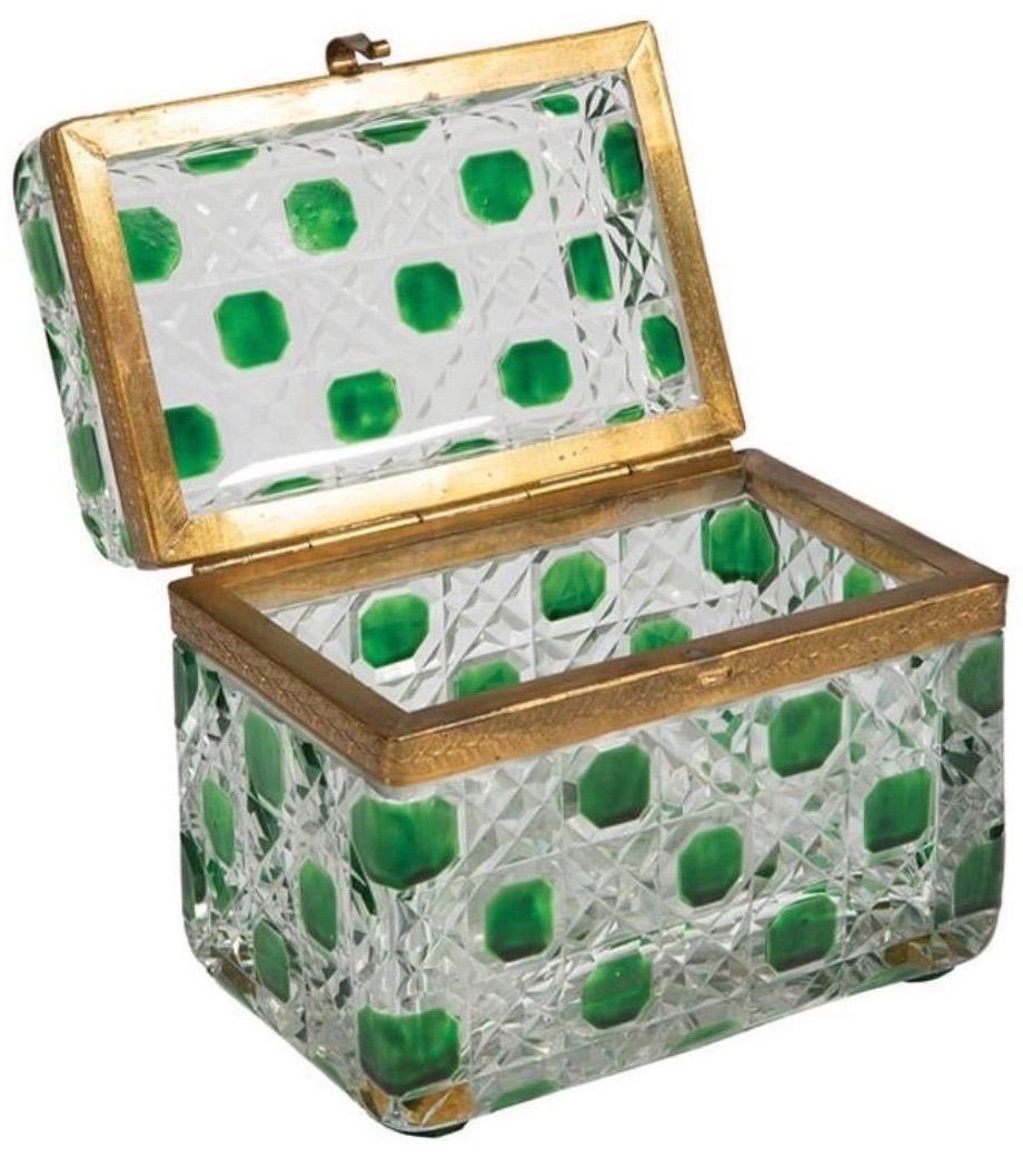 Baccarat cut green and clear glass box with tooled mounts and hinged lid.
  