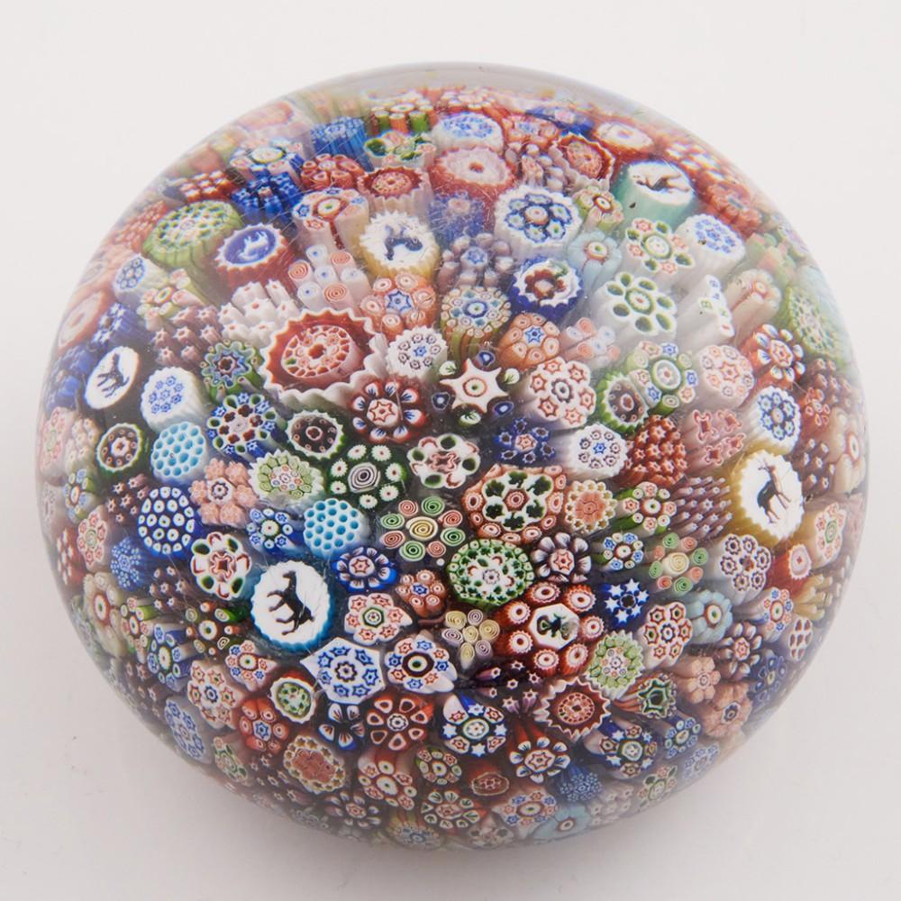 Heading : Baccarat Gridel Millefiori Closepack Paperweight c1848
Date : 1848
Origin : France
Features : Gridel canes of Cockerel, Dog, Horse, Devil, Stag, Butterfly Flower within a carpet of millefiori canes
Marks : A B1848 canes within set up
Type