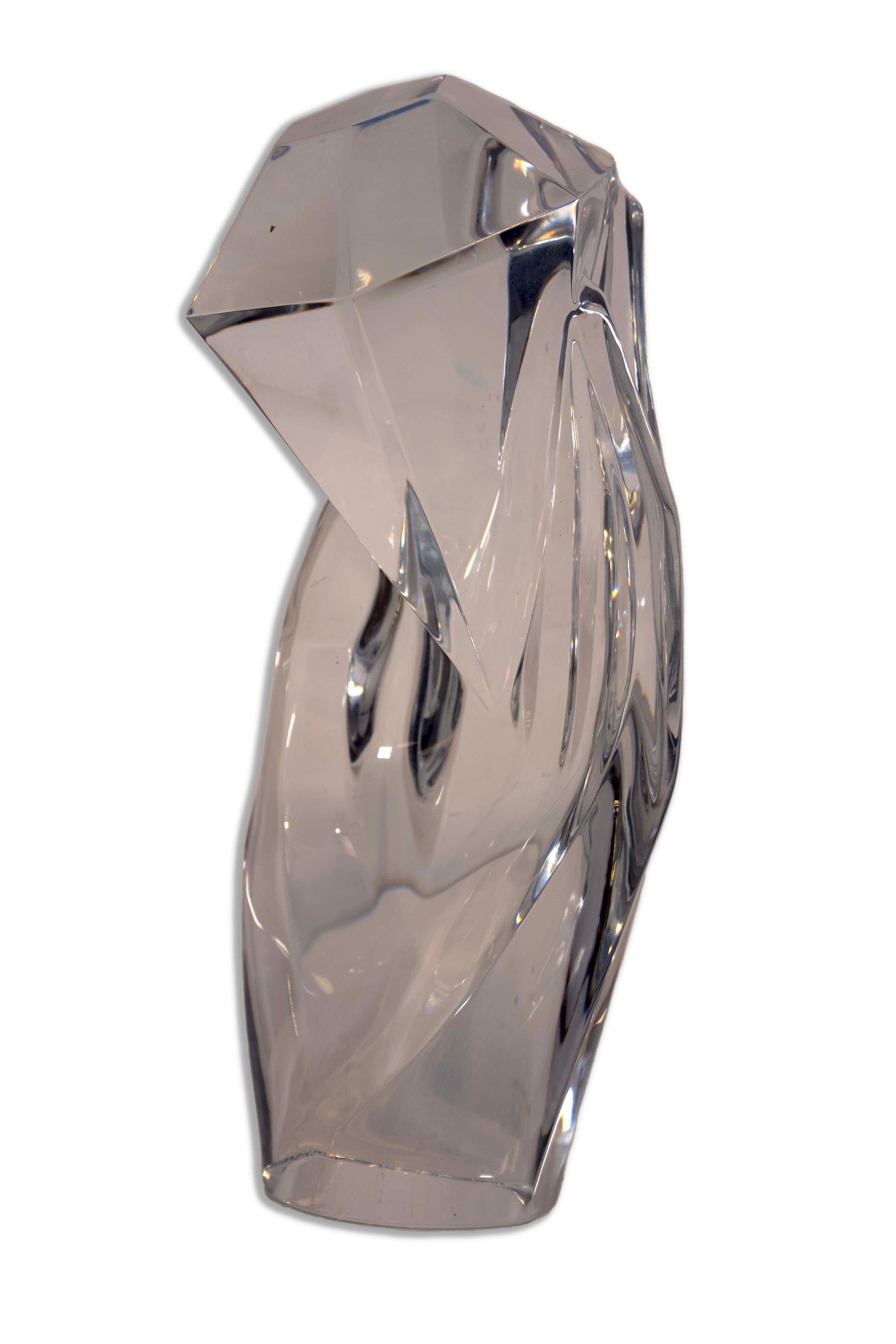 Introducing the Baccarat Hand of Rigot crystal vase, a luxurious and sculptural masterpiece made in France. This exquisite piece is a symbol of elegance, showcasing the iconic Baccarat craftsmanship with its sleek and reflective surface that plays