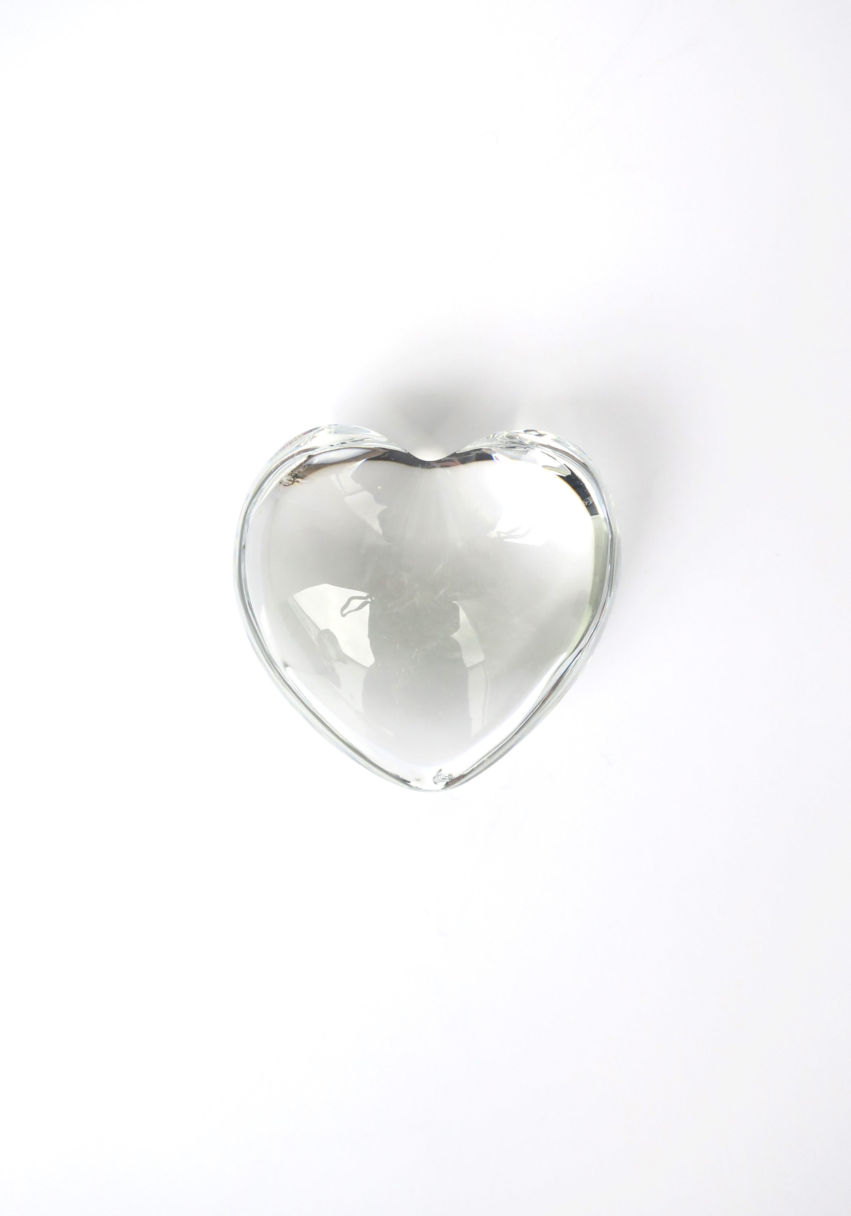 From French luxury crystal Maison Baccarat, a beautiful clear transparent puffed heart paperweight or decorative object, circa early 21st century, France. Heart is laser cut with small 
