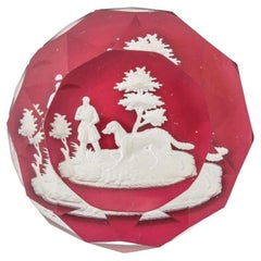 Baccarat Huntsman Sulphide Paperweight on Translucent Red Ground