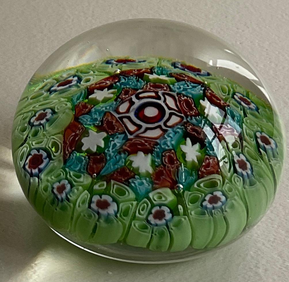 A beautiful millefiori Baccarat paperweight that will spark your imagination every time you put your eyes on it. The canes stand out as individuals, heightened small gaps between them are typical of the work from the late 1960s.

Hand blown and