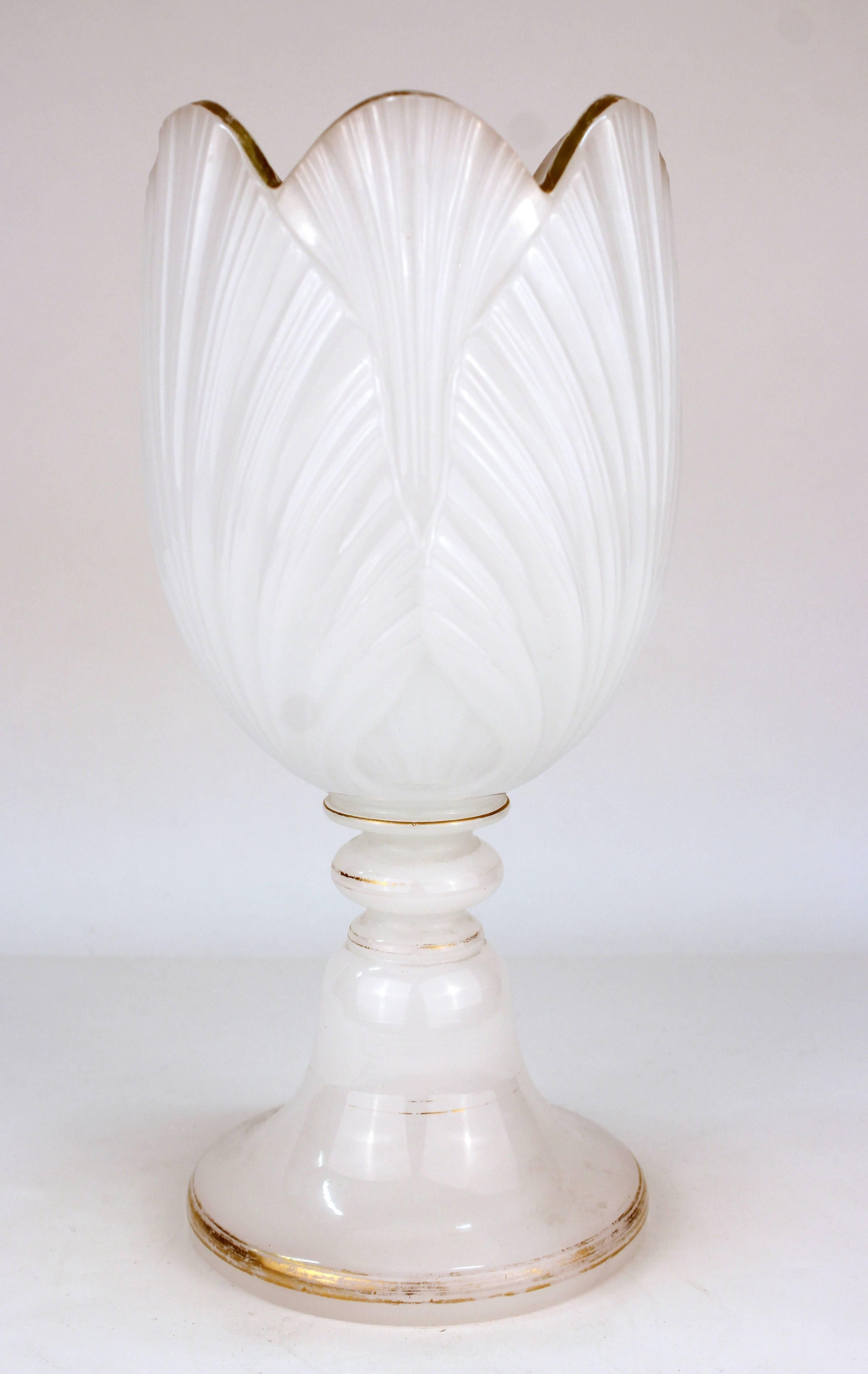 Baccarat opaline glass centerpiece in tulip flower form, with scalloped rim and gilt accents on a turned base. Significant wear to the gold decor, but overall in good vintage condition.