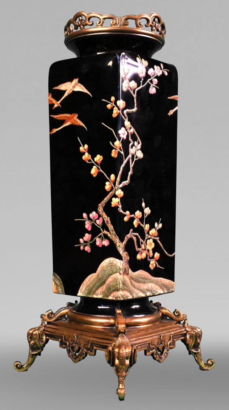 This pair of vases with Japanese-style decoration was made by the Baccarat glasshouse around 1880. 

Founded under Louis XV, the French Baccarat crystal factory demonstrated its excellence at the Universal Exhibitions throughout the 19th century.