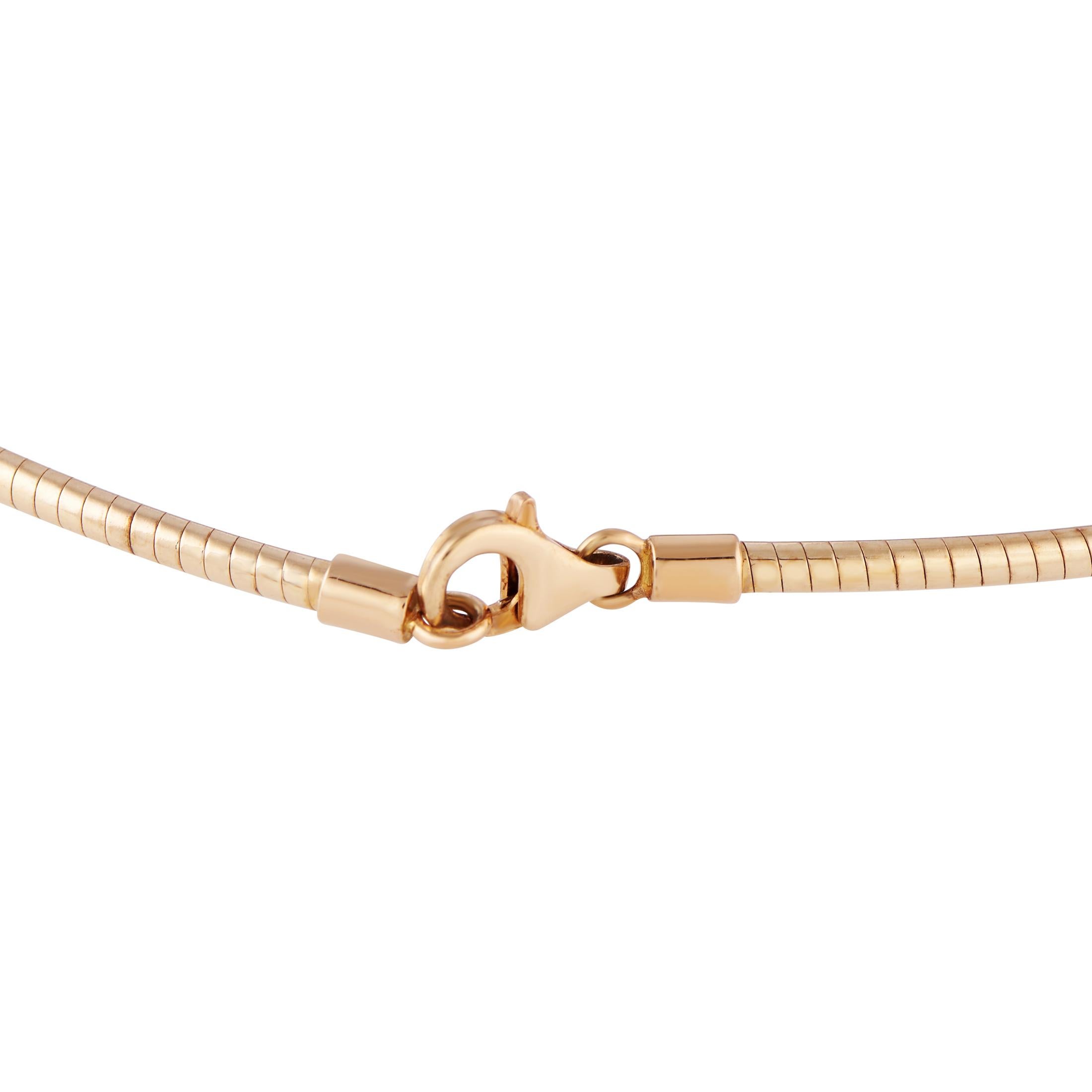 A 14-inch collar necklace designed by Stefano Poletti for Baccarat. This piece from Baccarat's Pampilles collection is crafted in 18K yellow gold and has an omega chain detailed with meticulously cut crystals that catch light elegantly. The crystals