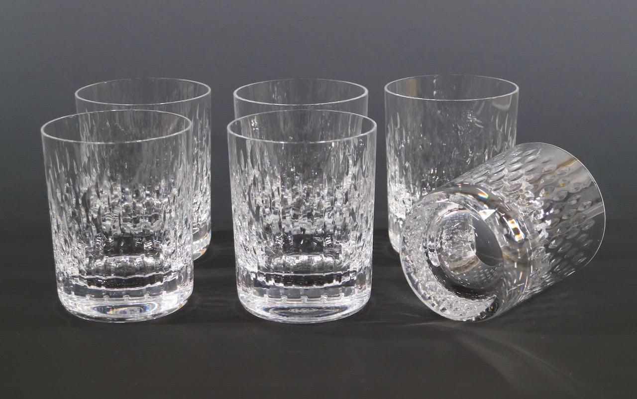 Baccarat set of six cut crystal old fashioned tumbler glasses with 'Paris' design pattern. The set has decorative vertical cuts, each glass can hold 10 oz. Made in France in the late 20th century, the set is in great vintage condition with