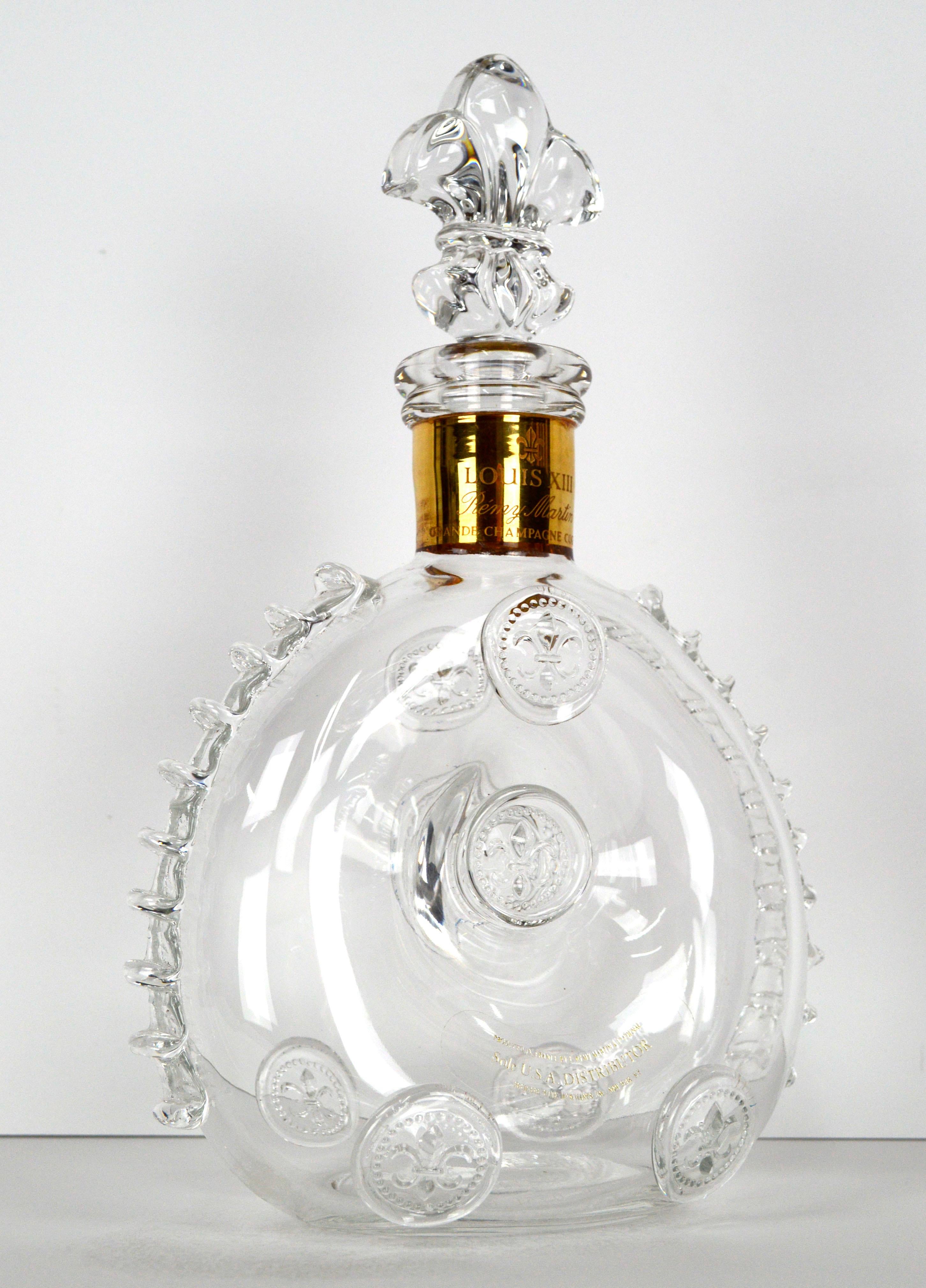 Magnificent Remy Martin Louis XIII Baccarat crystal cognac decanter bottle with stopper, by fine crystal manufacturer Baccarat (French, founded 1764). Remy Martin Baccarat Crystal mark is etched on base, with number x5432. The ornate stopper and
