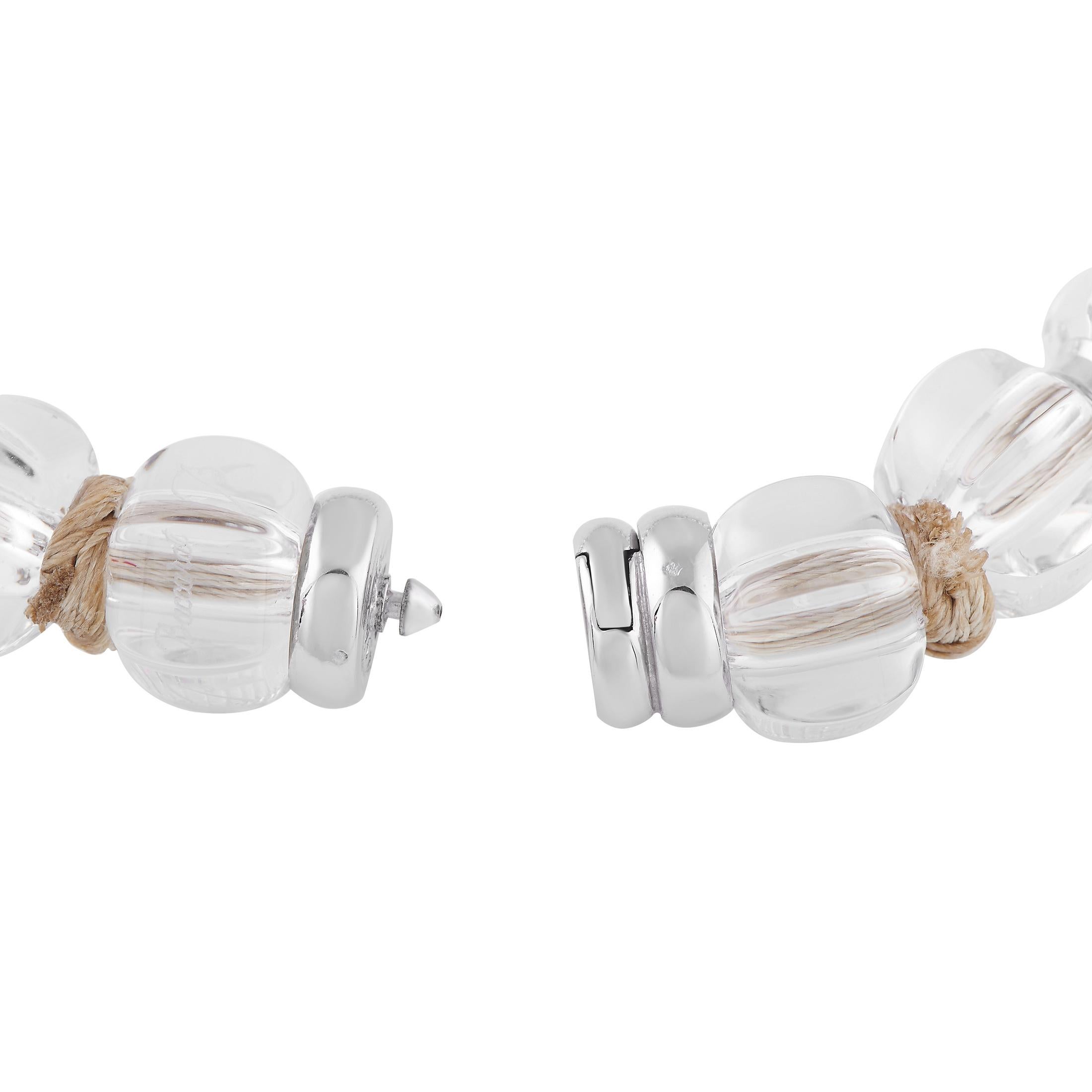 From the masters of crystal cutting, this Baccarat Sherazade necklace impresses with its ability to catch light--and attention. The necklace measures 16 inches long and features a line of oversized, cylindrical crystal beads. Dividing each bead,