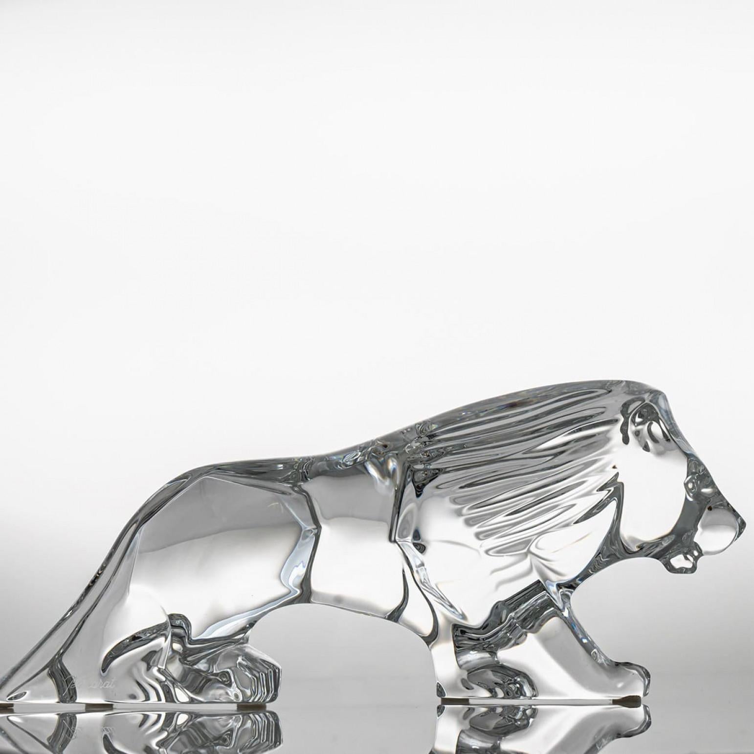 Luxury at its finest,  A collector’s item made by Baccarat in France. This crystal lion is made by Baccarat.

A lion, sculpted from clear Baccarat crystal, sits poised upon its base — a perfect embodiment of grace and power frozen in time. The