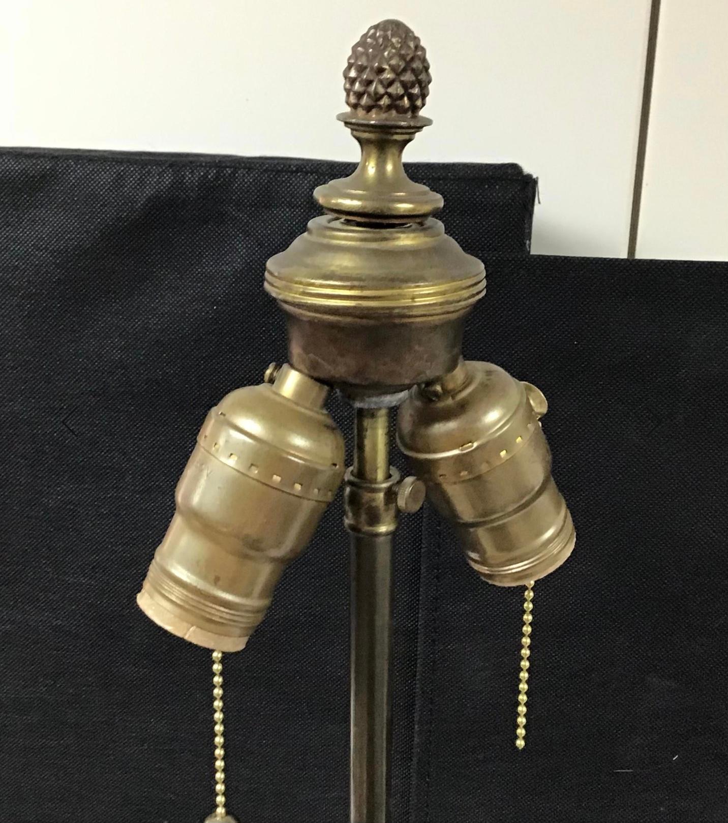 Extraordinary Baccarat style swirl molded glass urn lamp with brass bases and winged paw foot brass accents. Made from Baccarat molds. Gorgeous lamp.