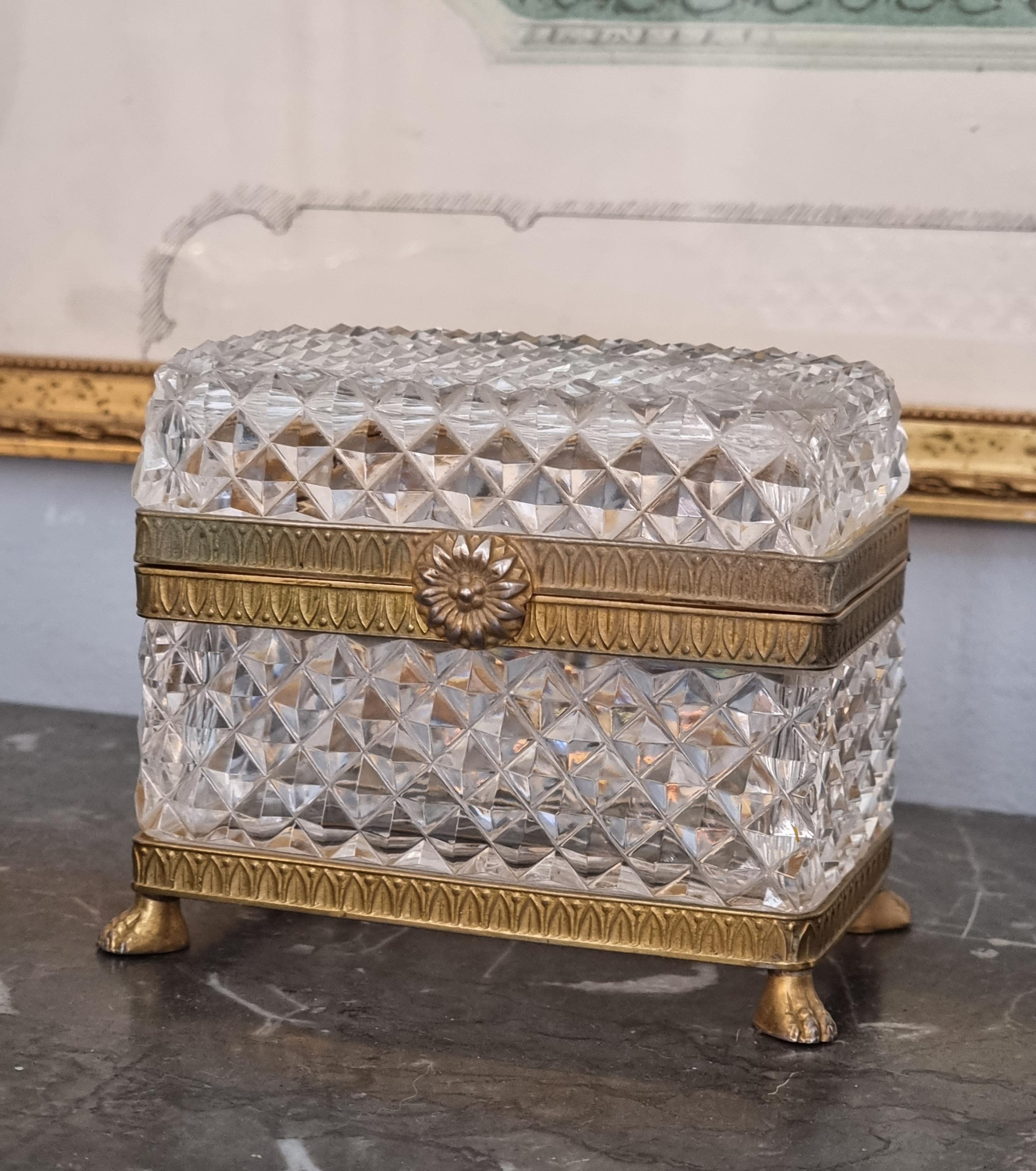 Metal Baccarat style cut crystal glass, ormolu casket box, clasp in shape of flower.