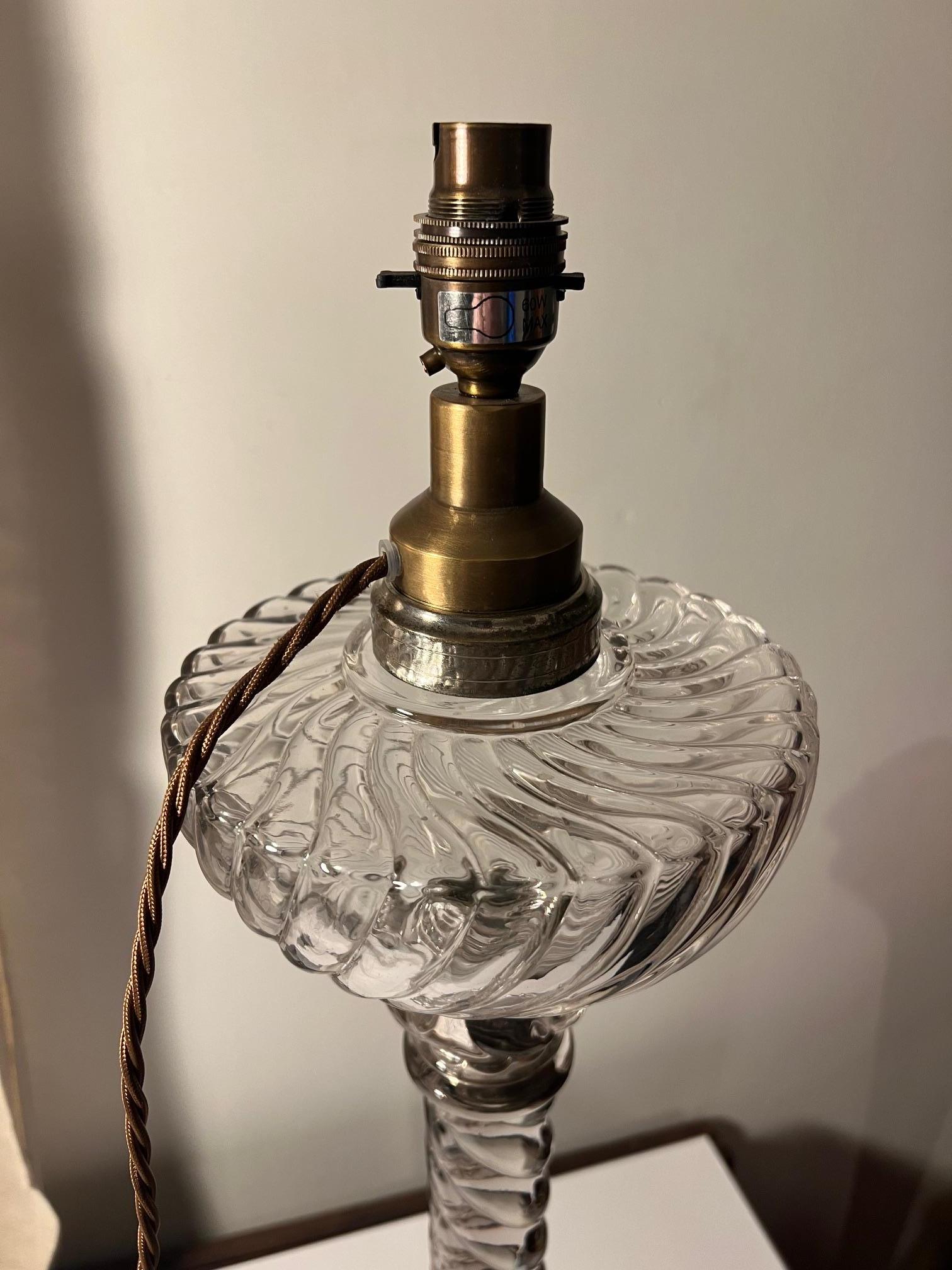 Stunning Baccarat pressed glass barley twist oil lamp, now converted to electricity.

Extremely decorative, nice height.

PAT Tested and U.K compliant.

Can be re-wired for anywhere globally, this will add an extra 10 days lead time.