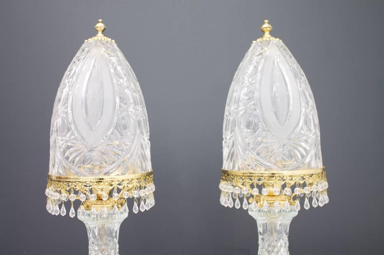 Pair of table lamp made of gilded brass crystal glass by Valéry Klein for Baccarat, France, 1960s.
Both lamps are marketed with baccarat and are in perfect condition. 

 