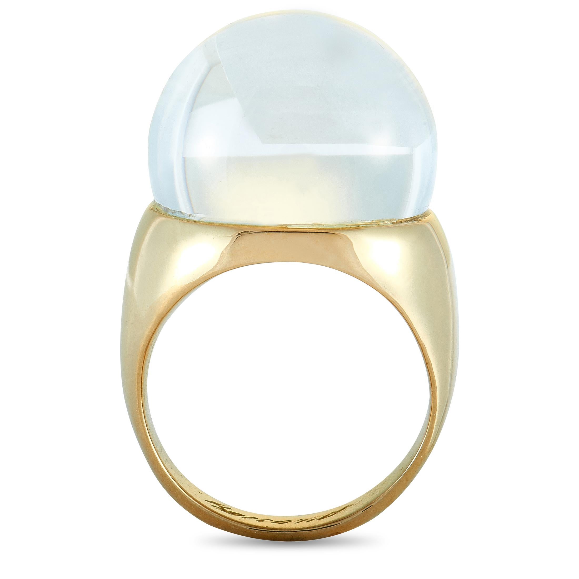This Baccarat ring is crafted from 18K yellow gold and set with a crystal. The ring weighs 16.5 grams, boasting band thickness of 4 mm and top height of 12 mm, while top dimensions measure 15 by 15 mm.

Offered in estate condition, this item