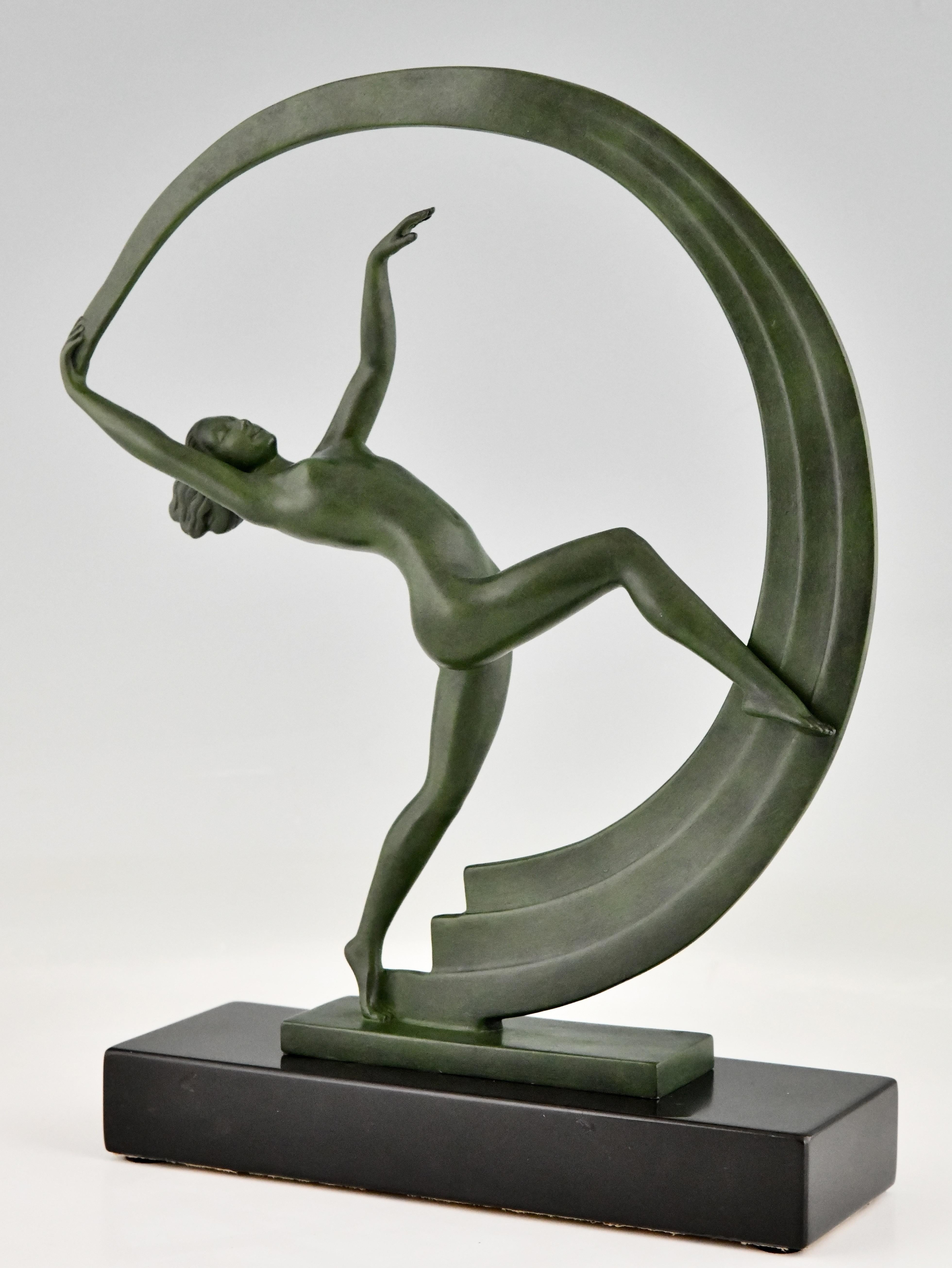 Art Deco sculpture nude scarf dancer Bacchanale by Janle for Max Le Verrier. Patinated art metal on a black marble base. France 1930.

Literature: This sculpture is illustrated in “Art Deco sculpture” by Alastair Duncan.