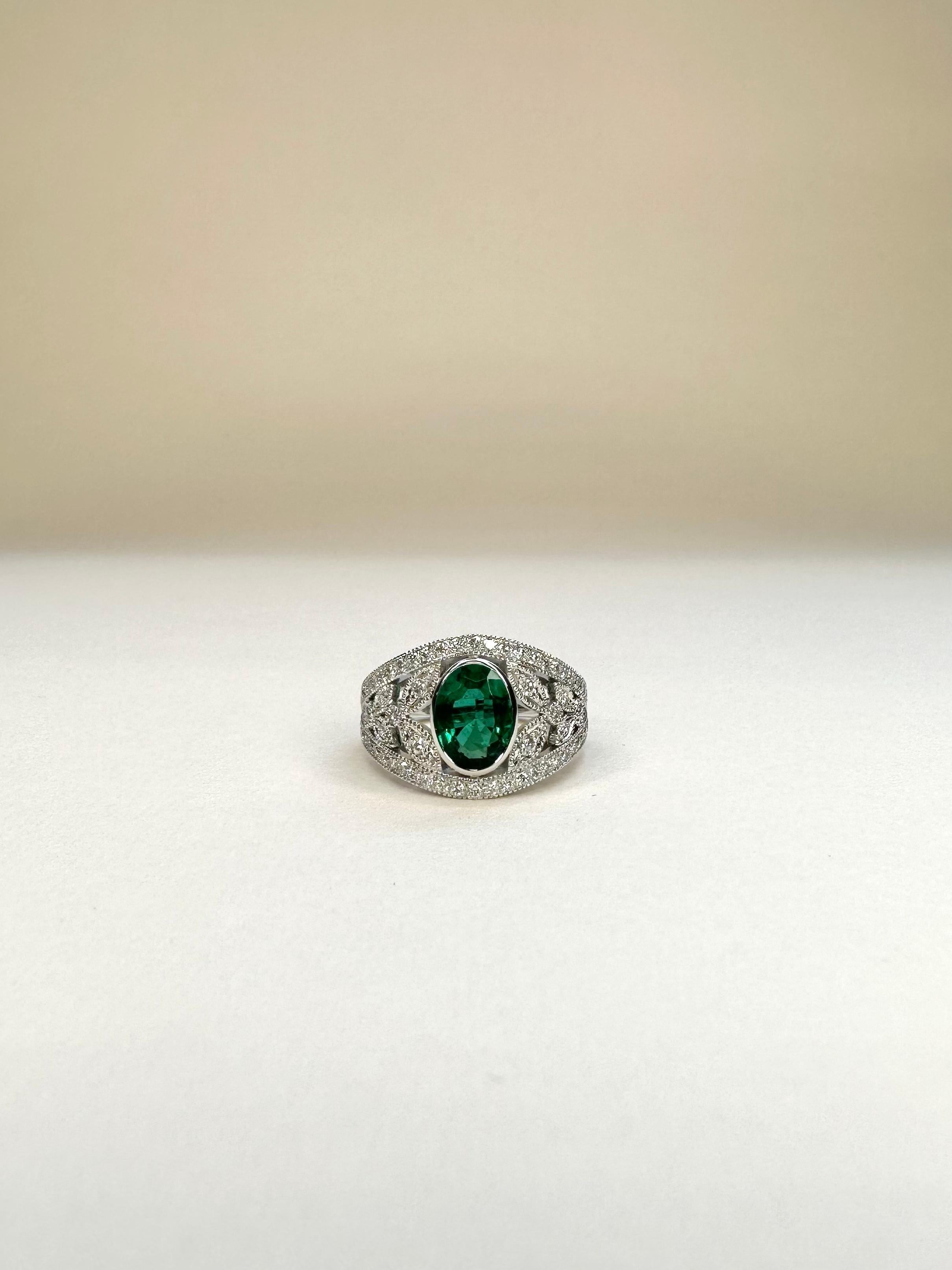For Sale:  18k White Gold Laurel Leaf Design 1.28 Ct Vivid Green Oval Emerald Ring 3
