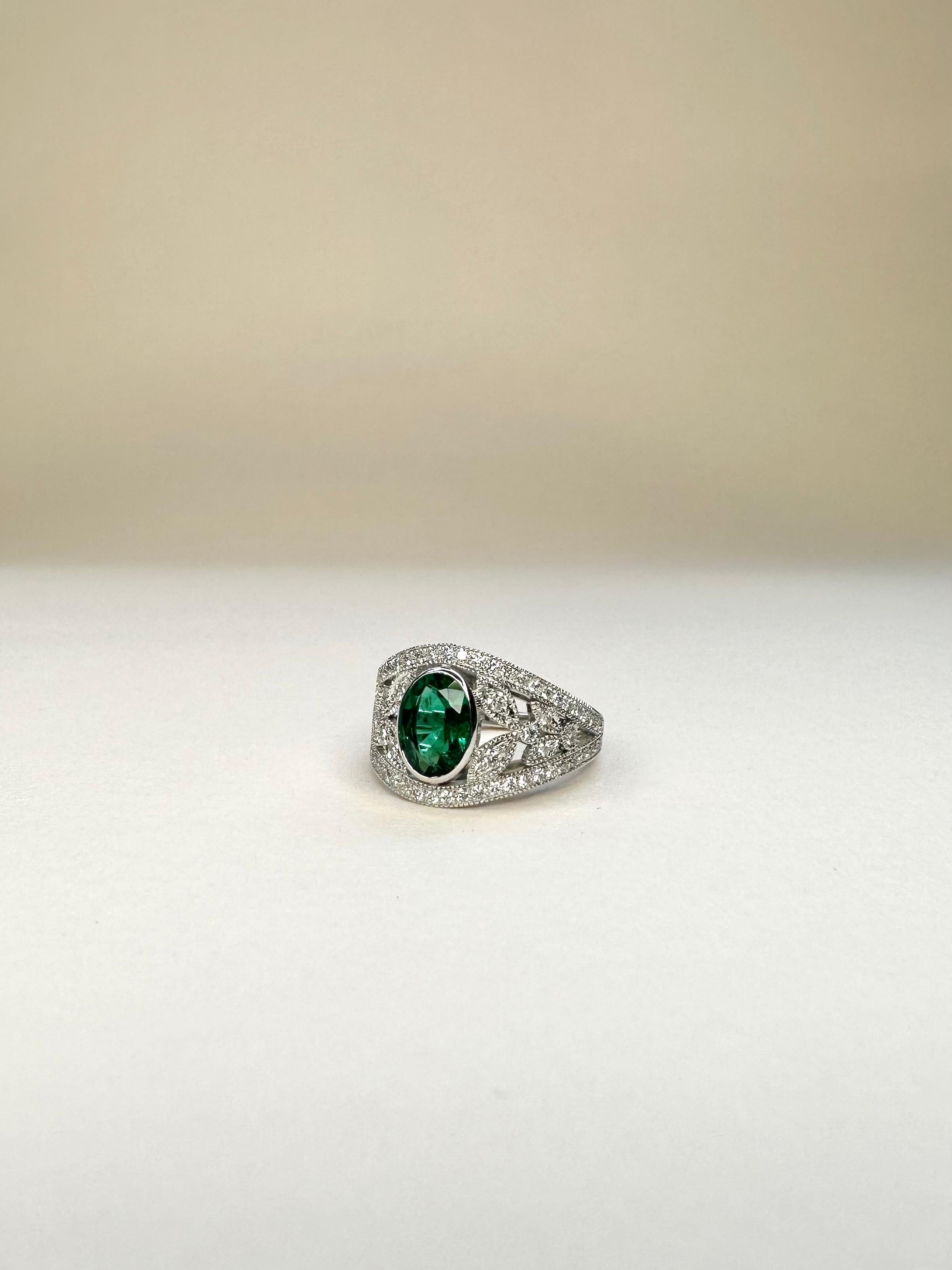 For Sale:  18k White Gold Laurel Leaf Design 1.28 Ct Vivid Green Oval Emerald Ring 4