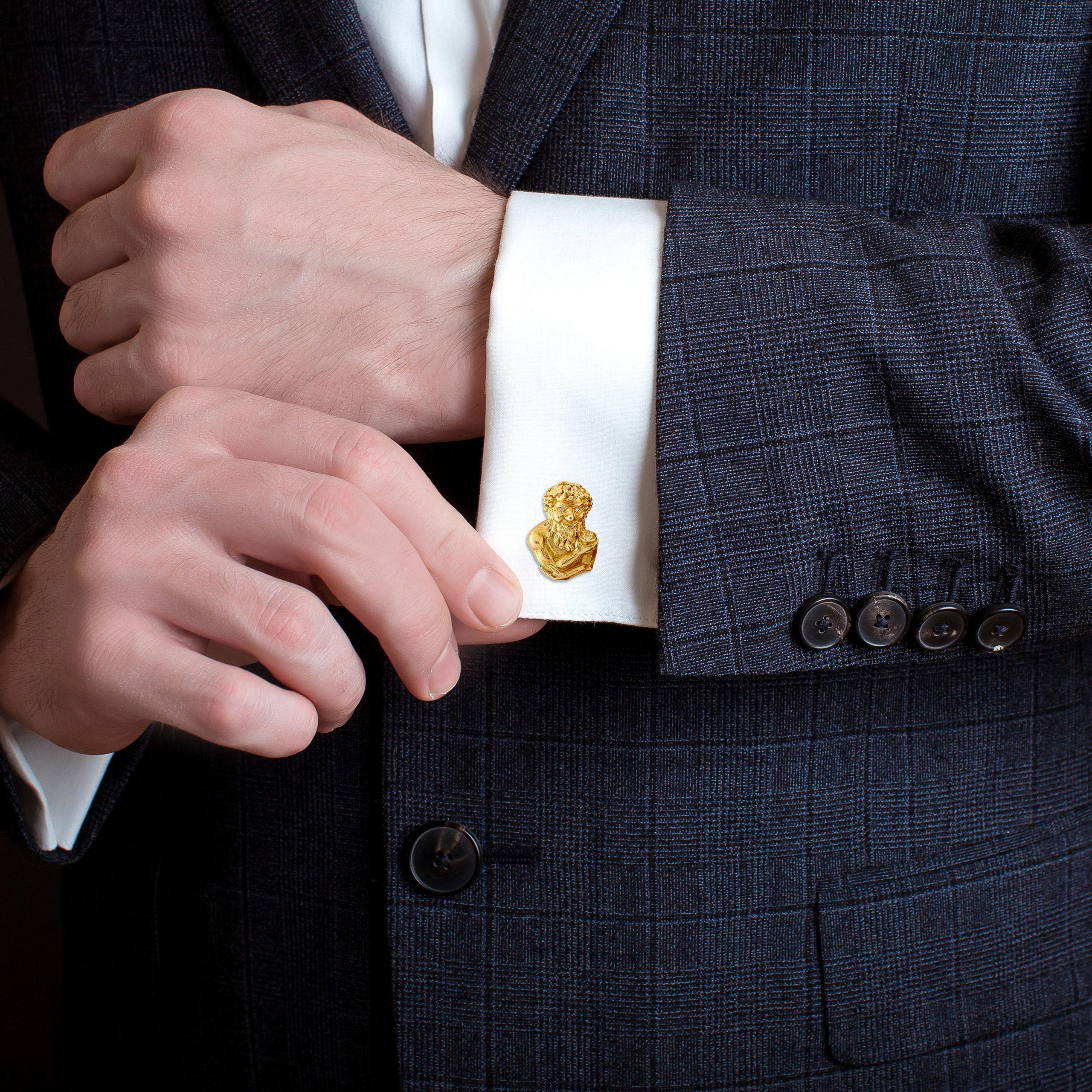 An exquisite pair of Bacchus diamond cufflinks set in solid 18 karat yellow gold, circa 1970. 
Each cufflink is designed as a bust of Bacchus, the mythical Greek character commonly known as the the God of wine. Here you can clearly see him holding a