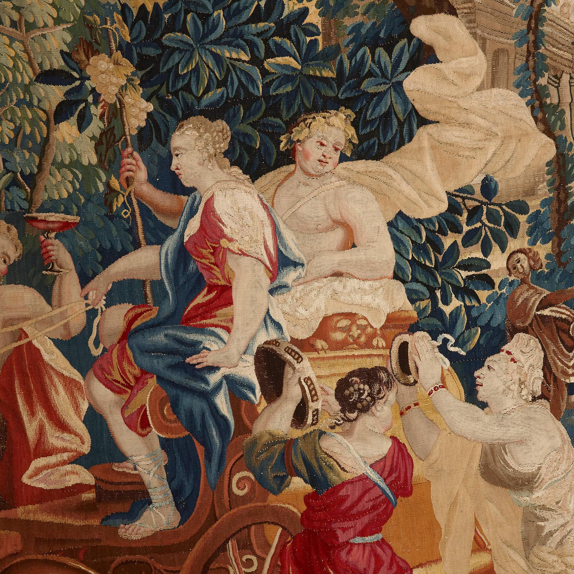 Bacchus and Ariadne, early 18th Century mythological tapestry
Flemish, early 18th Century
Width 428cm, depth 276cm, height 2cm

The tapestry is rectangular and is woven within a four-sided narrow golden frame pattern border. It depicts the god