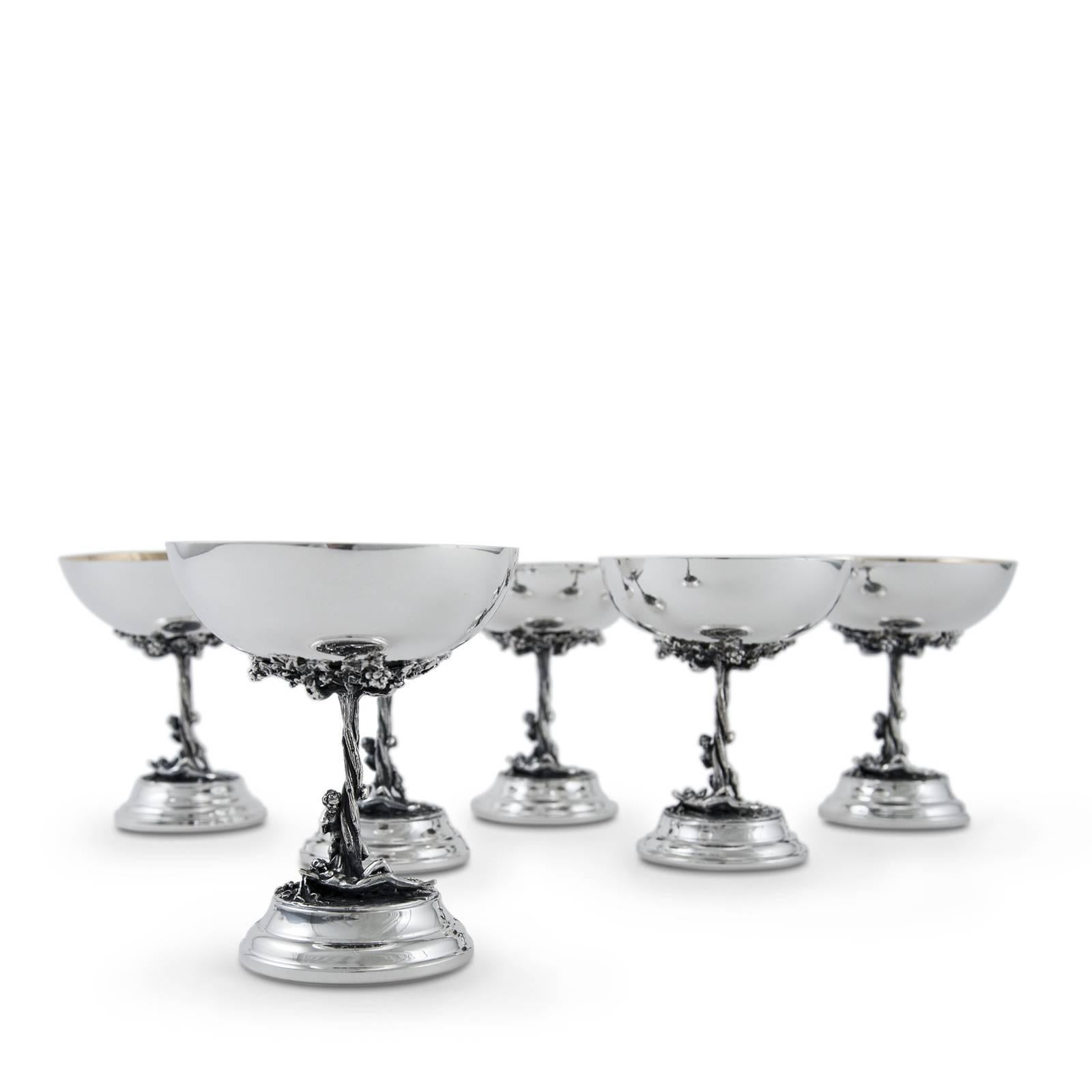 An ode to ancient Roman myth and traditional craftsmanship, this chalice is an elegant and unique work of art exquisitely crafted of silver by expert craftsmen. The smooth surface of the round base and semi-spherical cup are enriched by the stunning