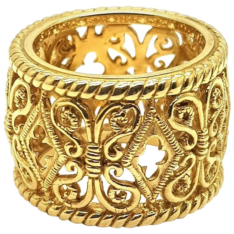 "Bach" 18 Karat Yellow Gold Ring with Ornament