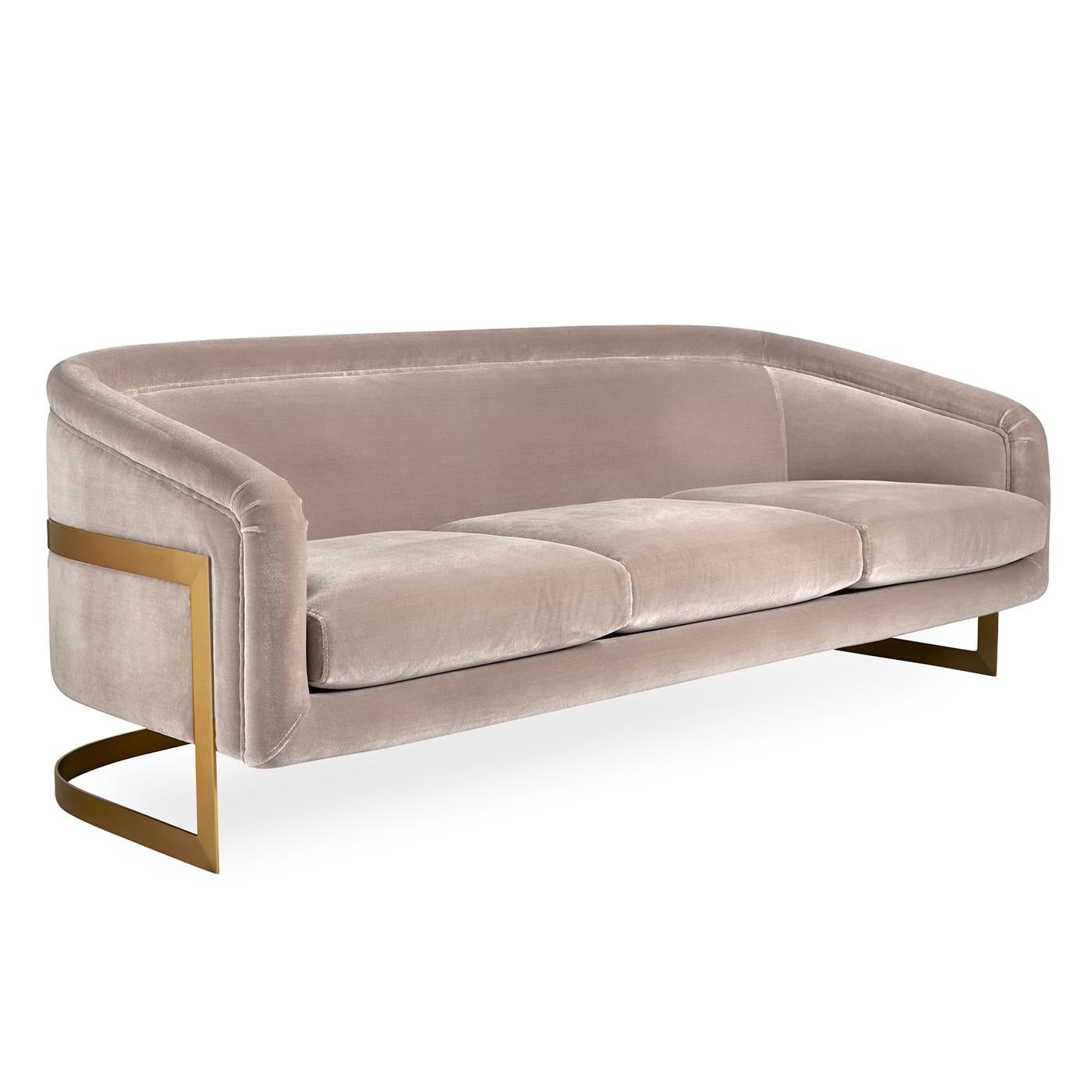 Louche Glamour. Think Halston, think Studio 54, think sybaritic style. Also think our signature Bacharach details, generously scaled for even more comfort. Featuring curved metal supports and fluid modern forms, this sofa is très chic from every