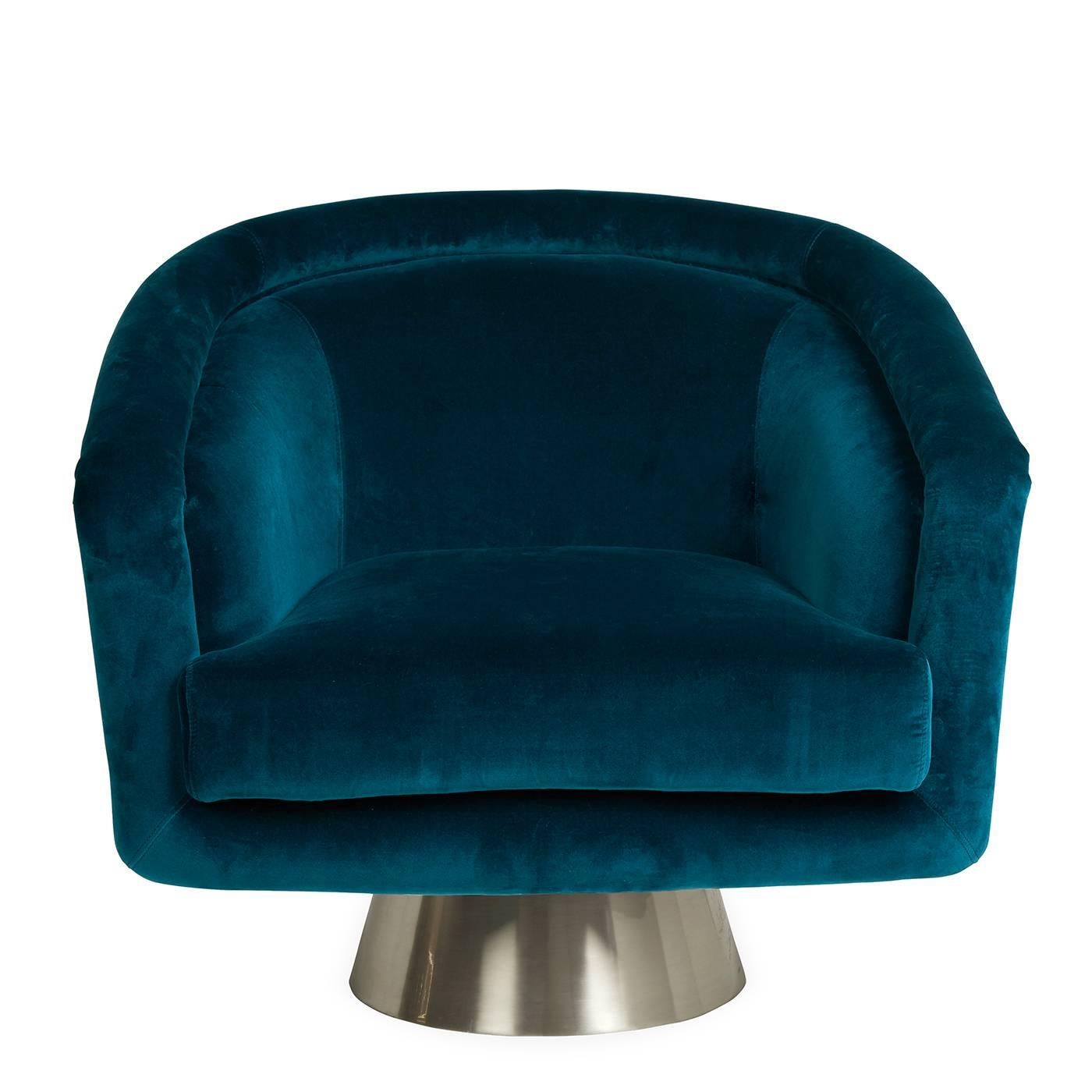 Louche glamour. Think Halston, think Studio 54, think sybaritic style. But also think cozy, comfy swivel chair. Upholstered in inky blue Rialto Reef velvet with an architectural brushed stainless steel swivel base.

Specs:
Seat depth: 20.5 in.
Lido