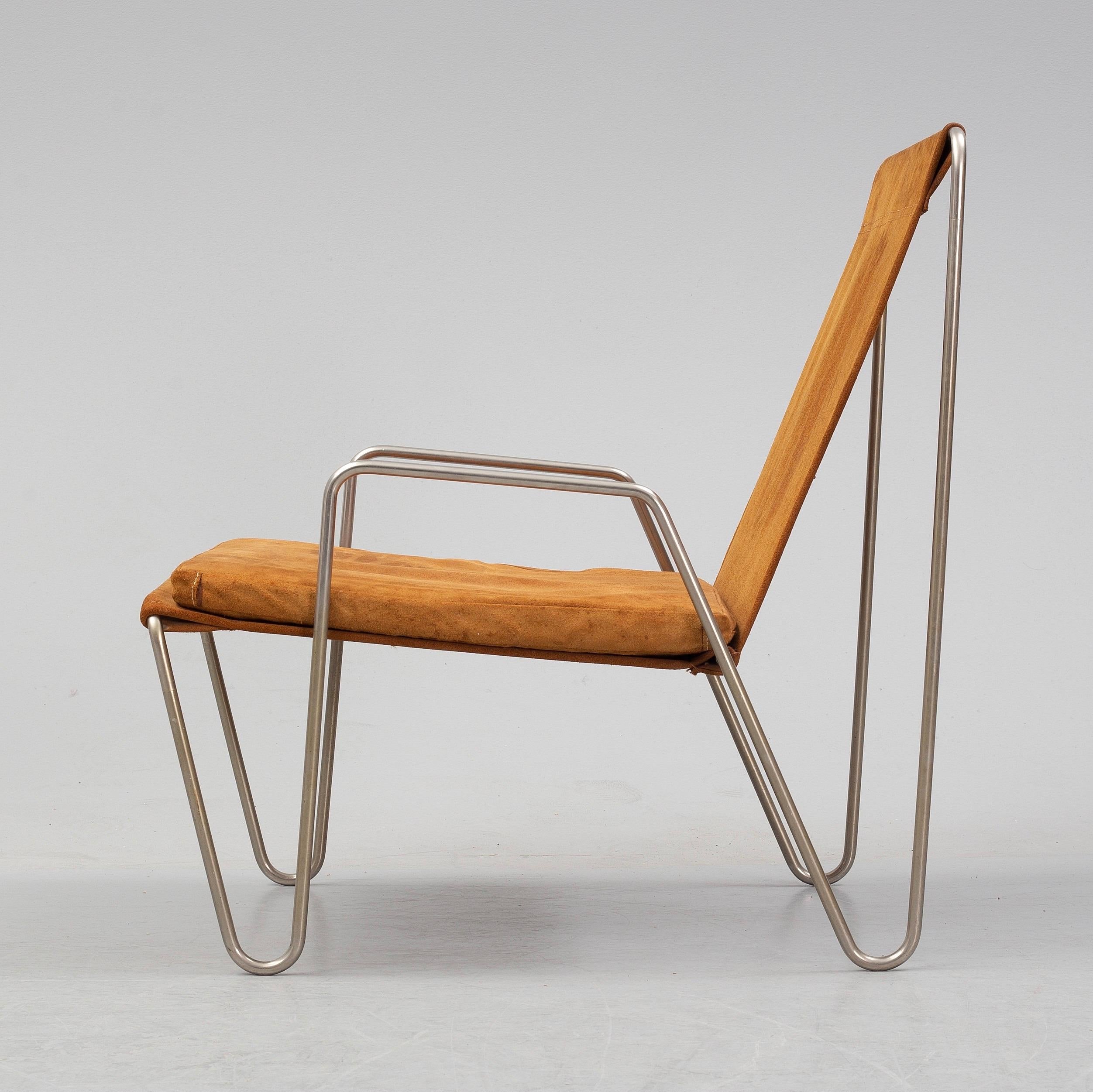 Bachelor easy chair made in brown suede leather designed in 1955 by Verner Panton, made by Fritz Hansen in Denmark.
