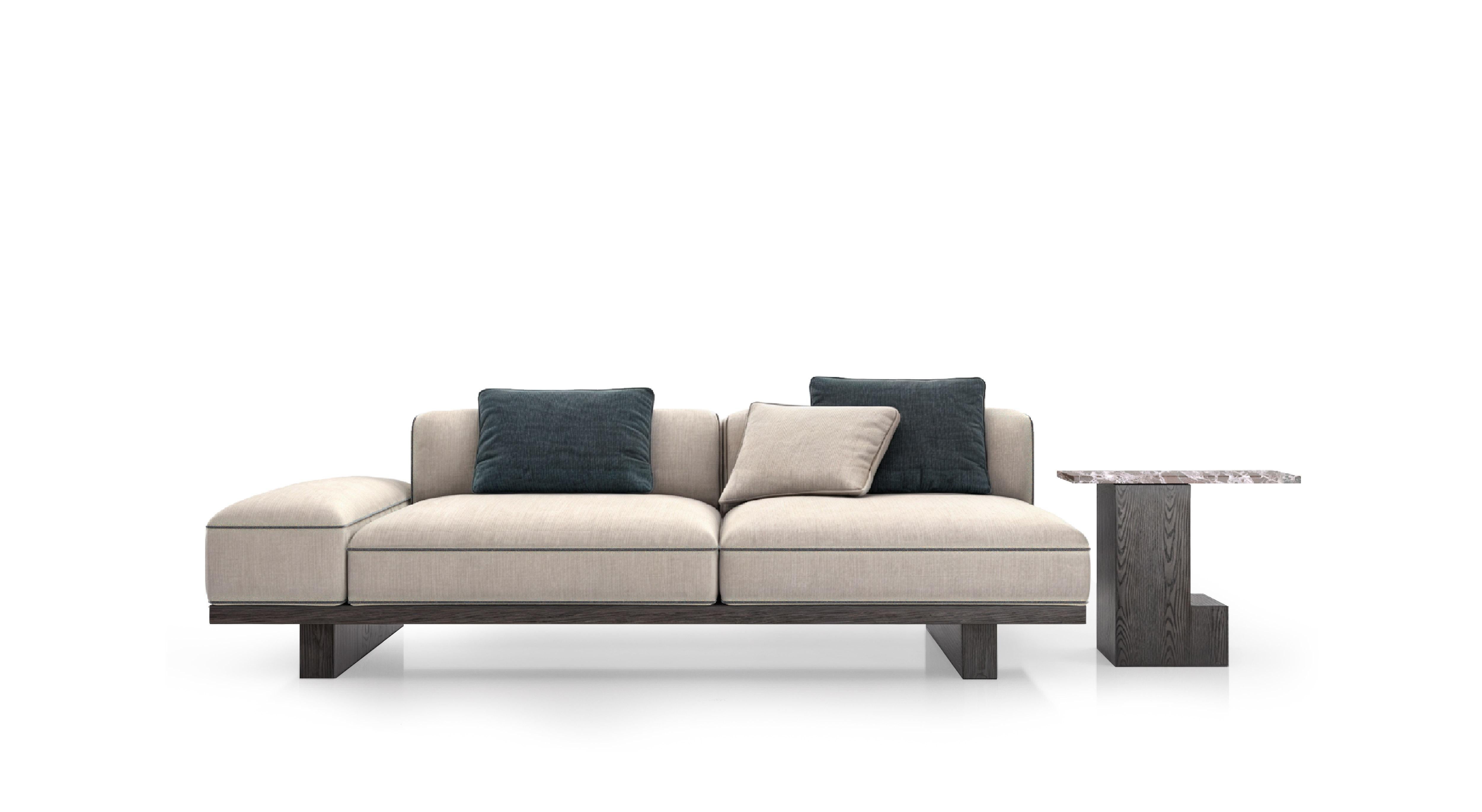 Introducing Background, a unique sofa with a simple and minimal design, both in form and component choice. What sets it apart is the stitching of all the soft elements and the chromatic contrast with the supporting structure. It is supported by a