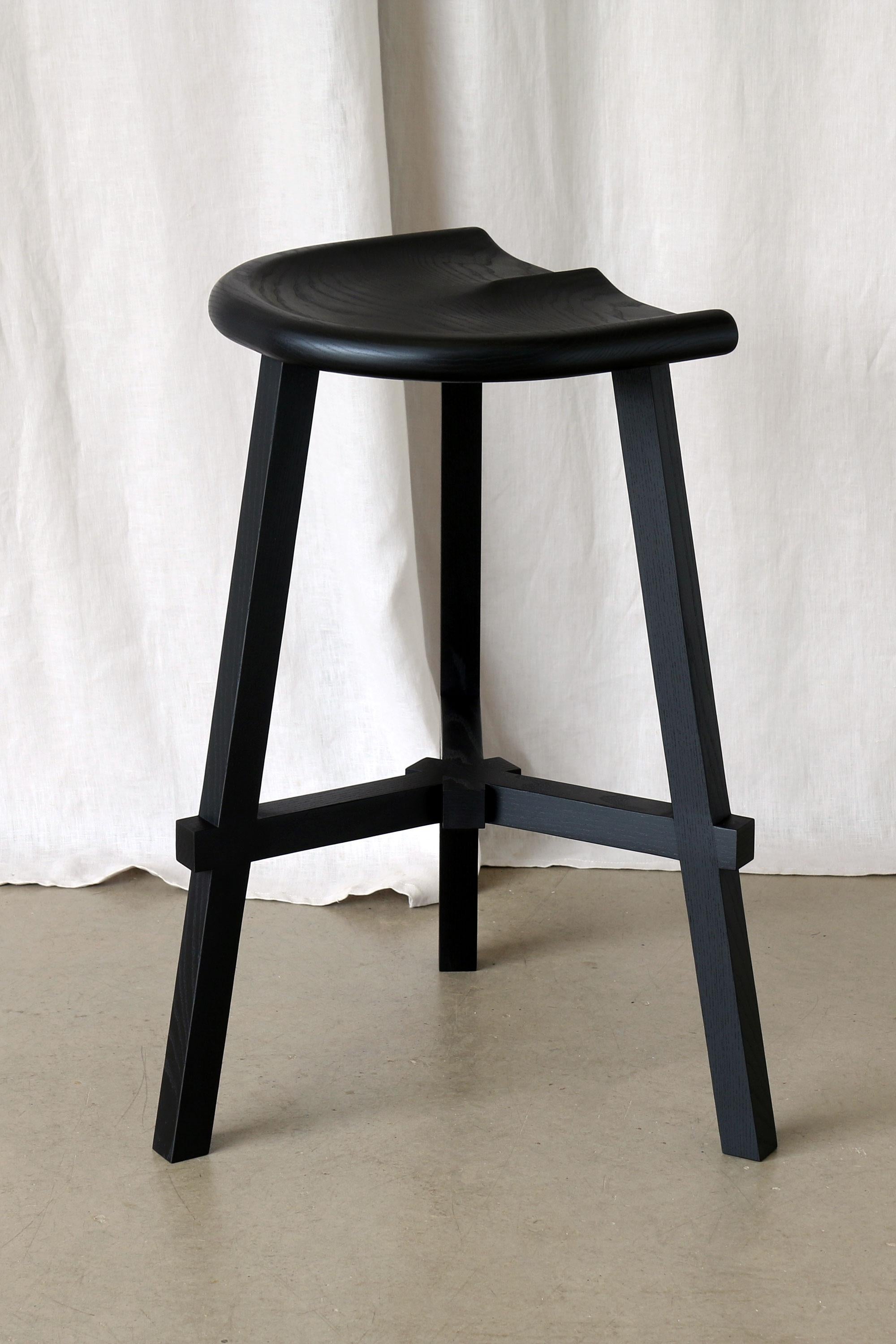Introducing the Conti Wooden Kitchen Stool – the perfect blend of functionality and elegance, designed to elevate your kitchen island or home bar decor. Crafted with care, this kitchen island bar stool combines a sleek, minimalist aesthetic with