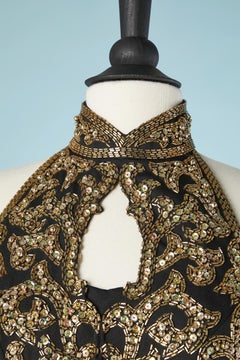 Backless long black crêpe satin evening dress with gold beaded bust Ted Lapidus