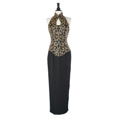 Backless long black crêpe satin evening dress with gold beaded bust Ted Lapidus 