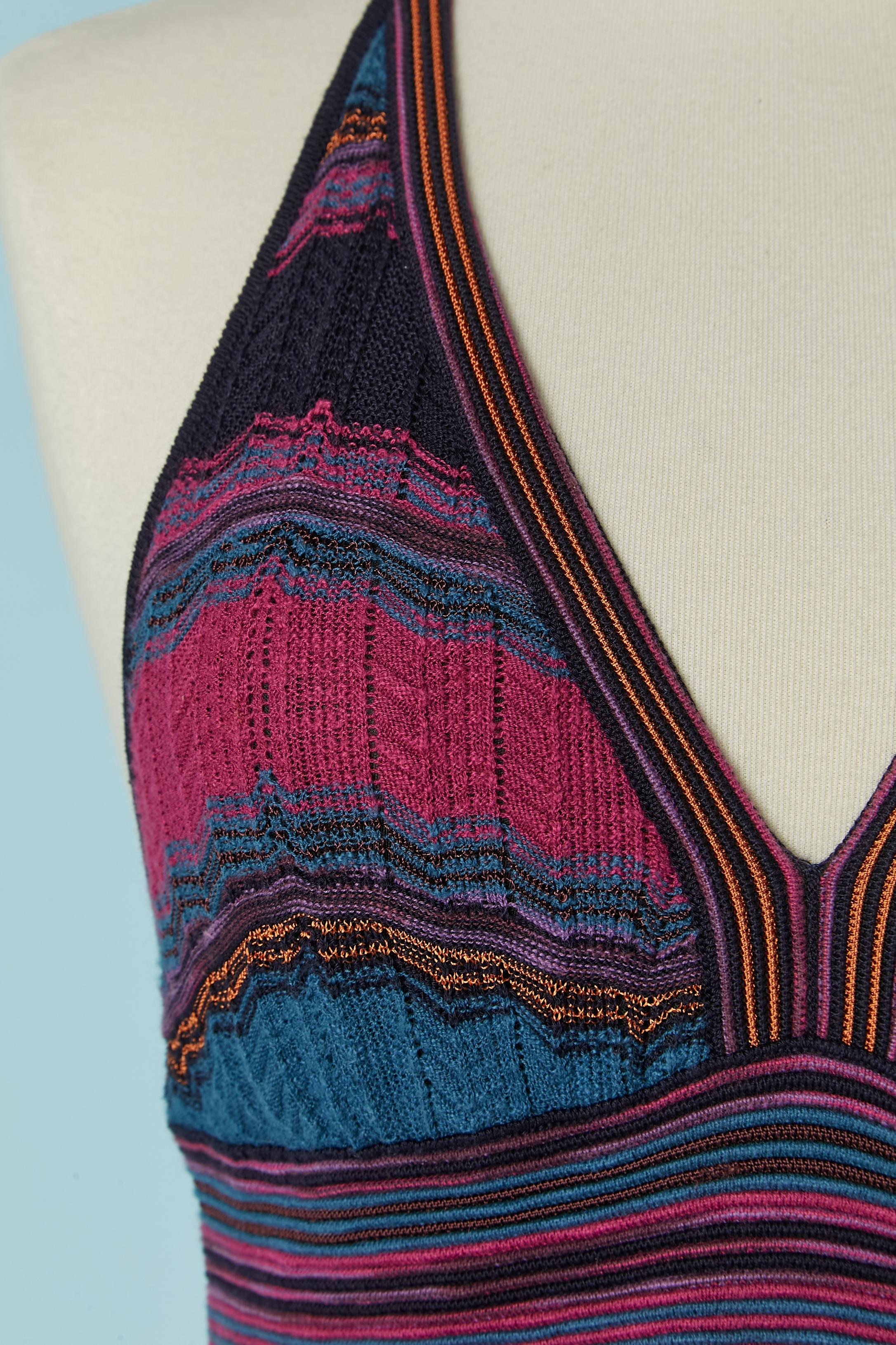Robe dos nu en tricot multicolore. Doublure en polyester noir. 
TAILLE XS/ S 