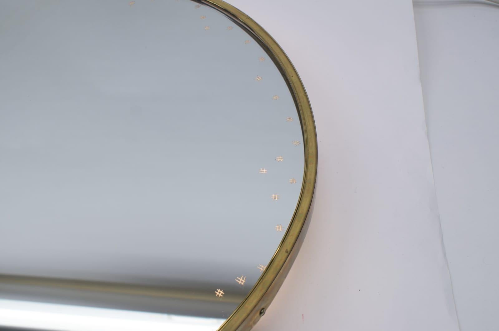 Backlit Brass wall Mirror With Engraved Stars and Perforated Plate Frame, 1950s 3