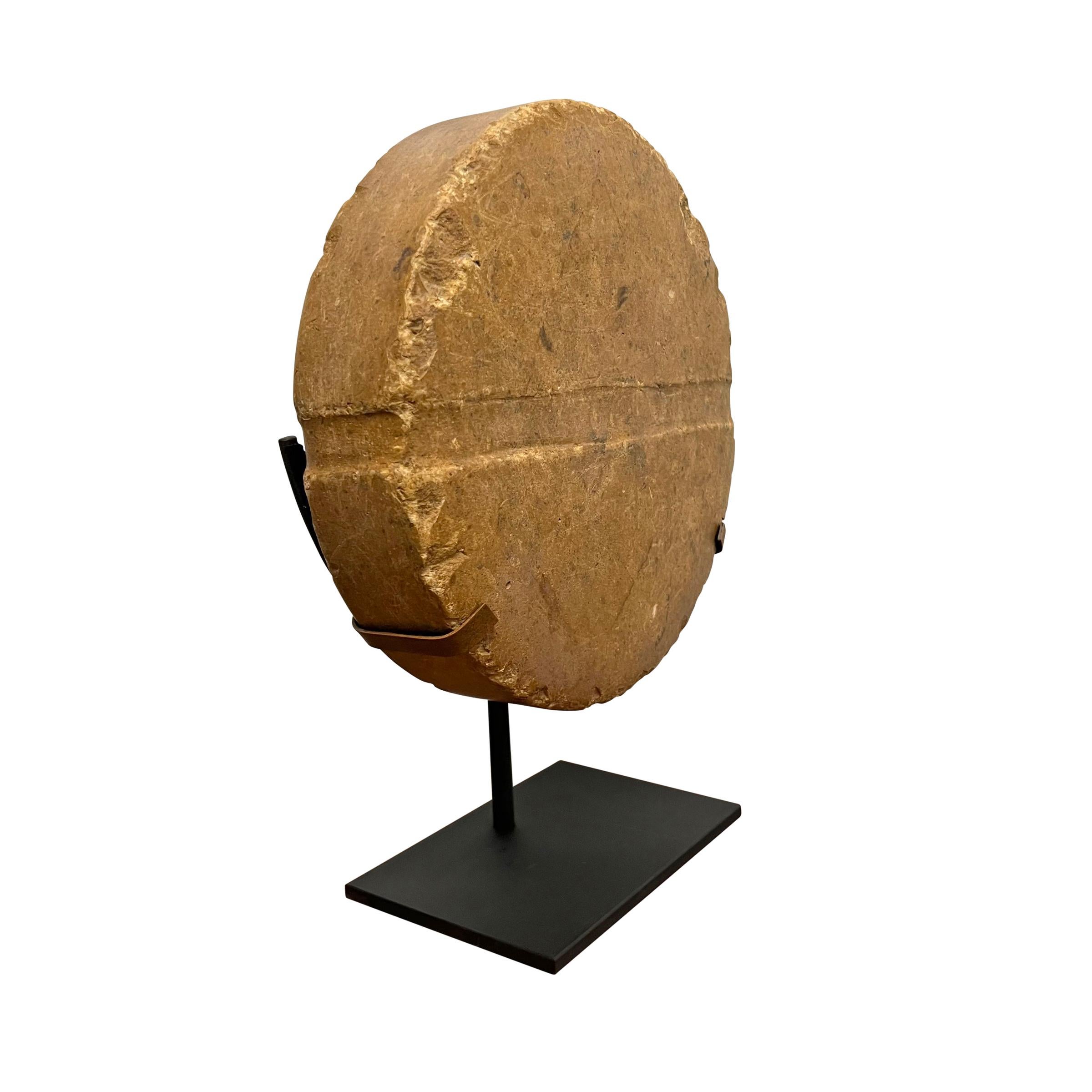 marble disc on stand