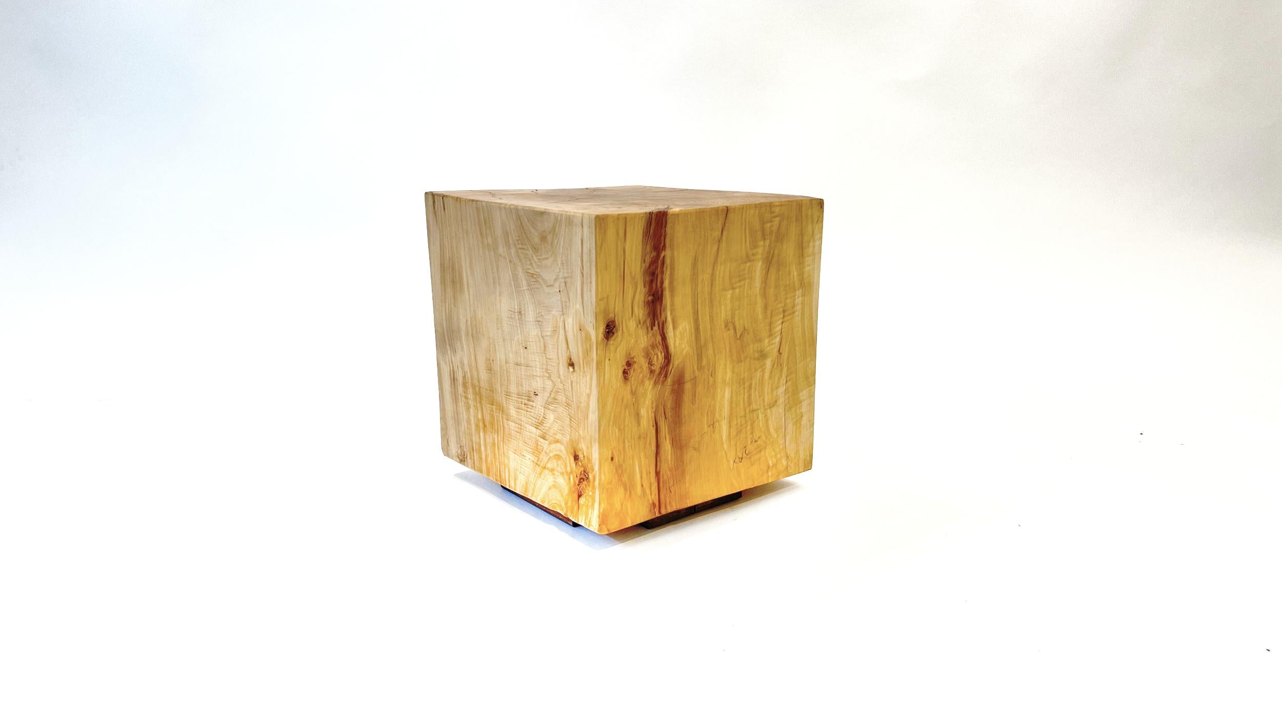 Bad Cube has been with us for years as we let it dry out in our shop. Initially a tree stump with chainsaw scars, we extracted the Milkyway inside to a geometrical shape. This cube is not perfect but it will make for a great stand, seat, or side