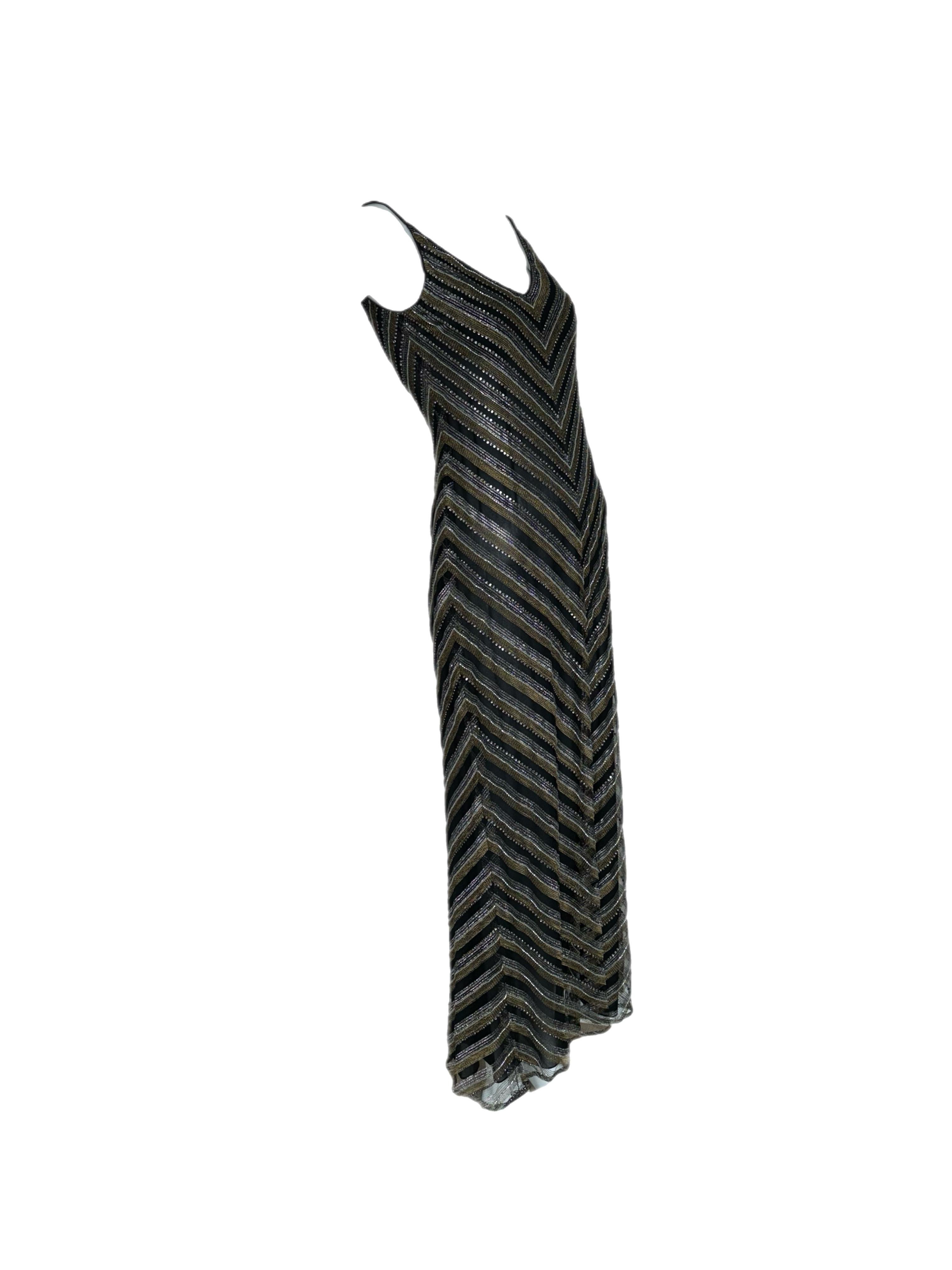 Badgley Mischka
Runway
Vintage
FW95
USA size 6
Excellent Condition, no flaws

This gown is comprised of silver, gold, black, it's basically a metallic mix, making it compatible with silver, gold, or black shoes.

FINAL SALE