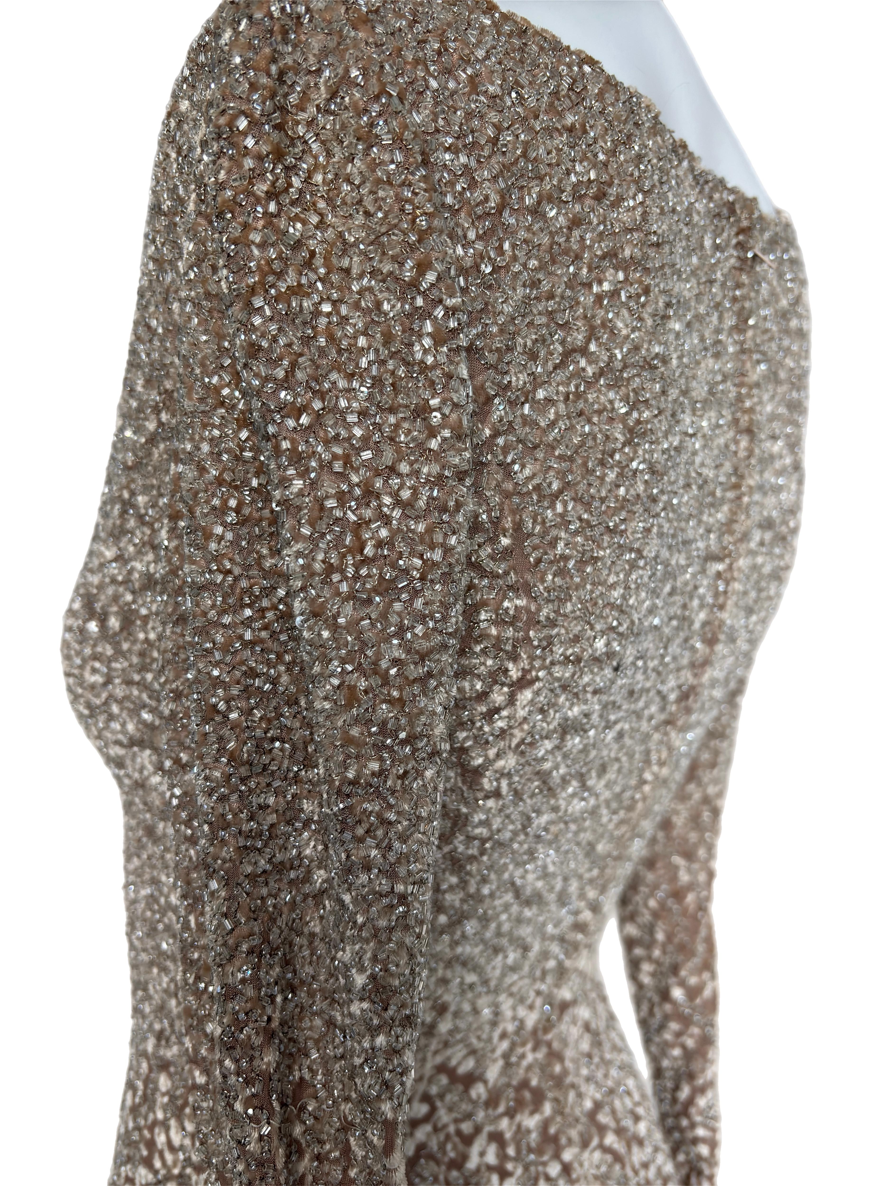 Badgley Mischka
Vintage
Bata de manga larga de color arena y preciosas cuentas
Falta la etiqueta de talla y comp, consulta las medidas más abajo, probablemente se ajuste como una talla 0/2
Impecable
Medidas en centímetros en posición horizontal: