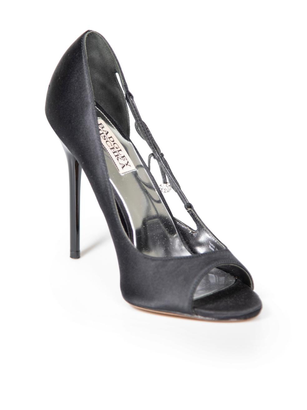 CONDITION is Very good. Minimal wear to heels is evident. Minimal wear to back left heel with small abrasion to the satin on this used Badgley Mischka designer resale item. Comes with original dust bag.
 
 
 
 Details
 
 
 Black
 
 Satin
 
 Slip on