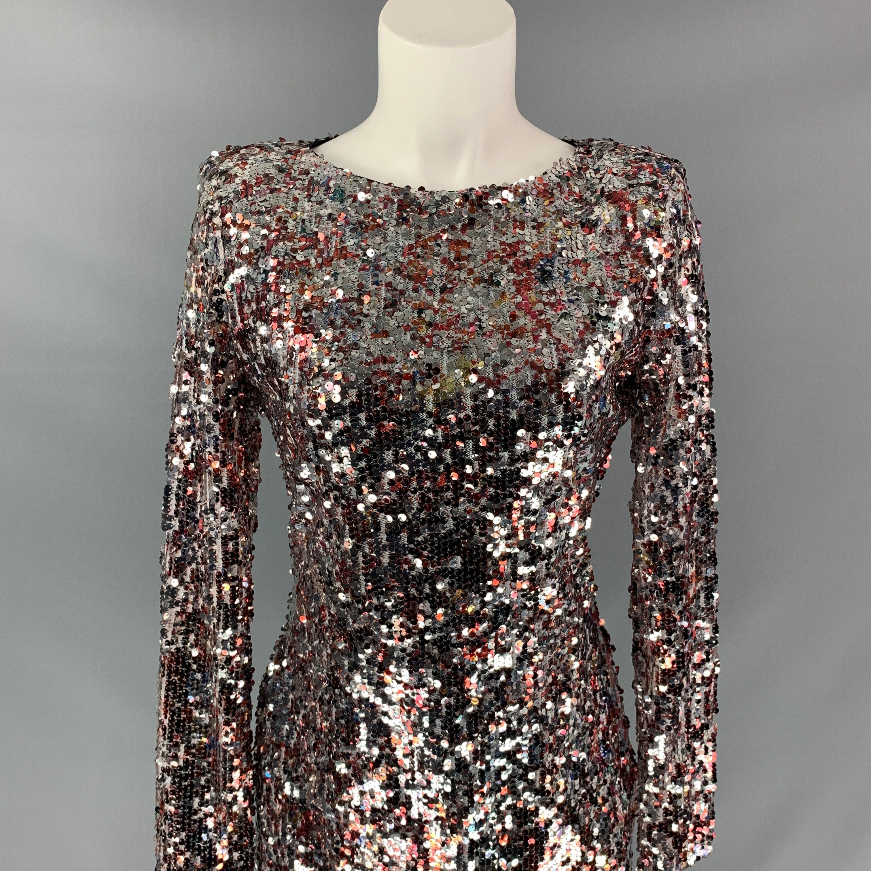 BADGLEY MISCHKA by Mark and James dress comes in a silver & burgundy sequined material featuring a mini style, a-line, long sleeves, and a back zipper closure.
Very Good
Pre-Owned Condition. 

Marked:   M 

Measurements: 
 
Shoulder: 15 inches 