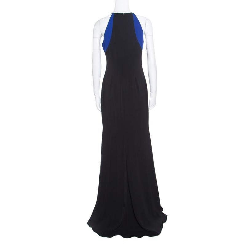 You'll leave onlookers stunned when you step out wearing this scintillating evening gown from Badgley Mischka. The sleeveless creation is made of a polyester blend and features a flattering feminine silhouette. It flaunts a colourblock detailing on