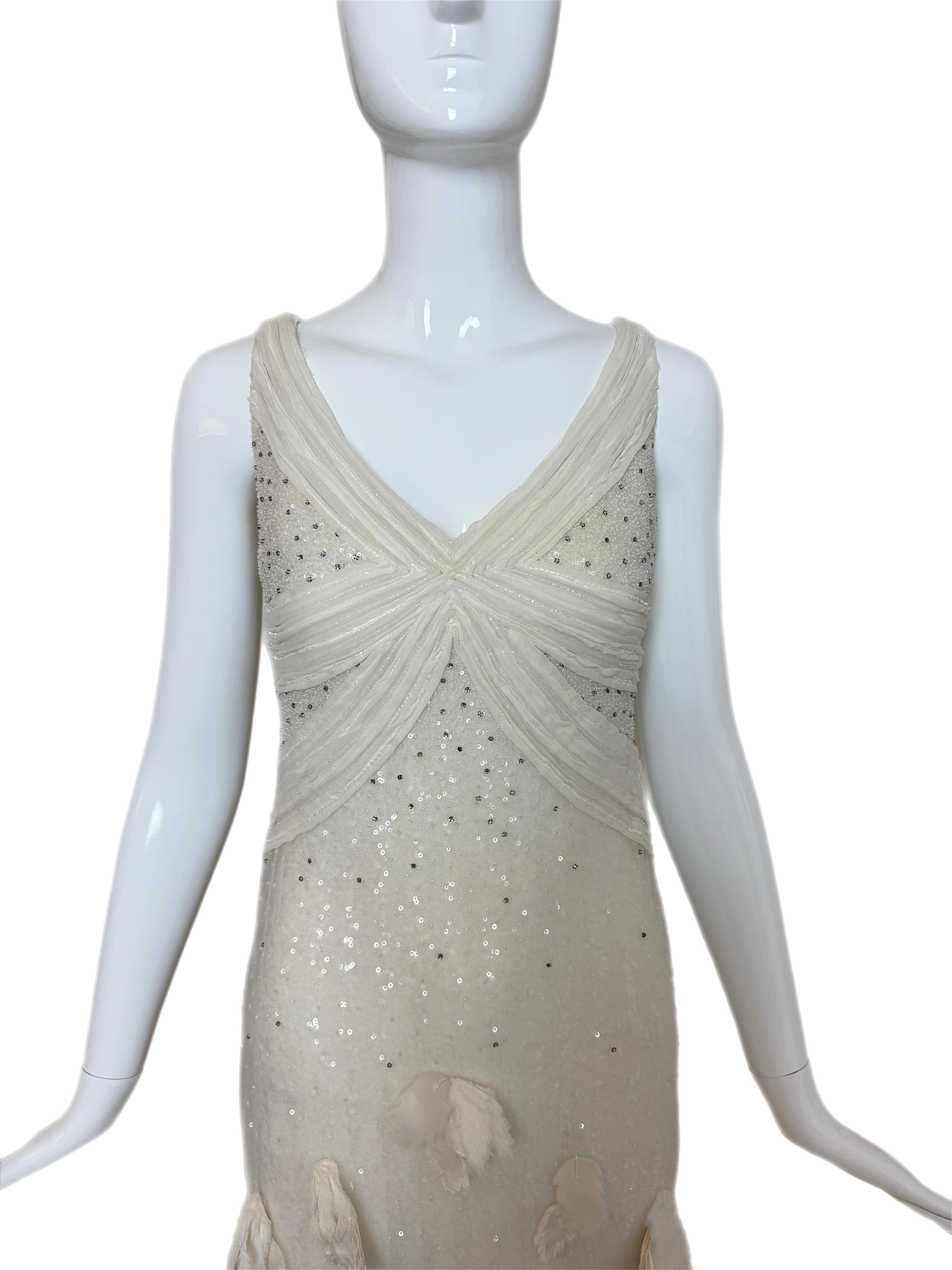 Badgley Mischka Costura
Resort 2011
Vintage
Pista
Color marfil
Los pétalos pretenden parecerse a las plumas, sin embargo, no hay plumas reales en este vestido
Falta la etiqueta de talla y comp
Se ha recogido profesionalmente en las correas
Gran